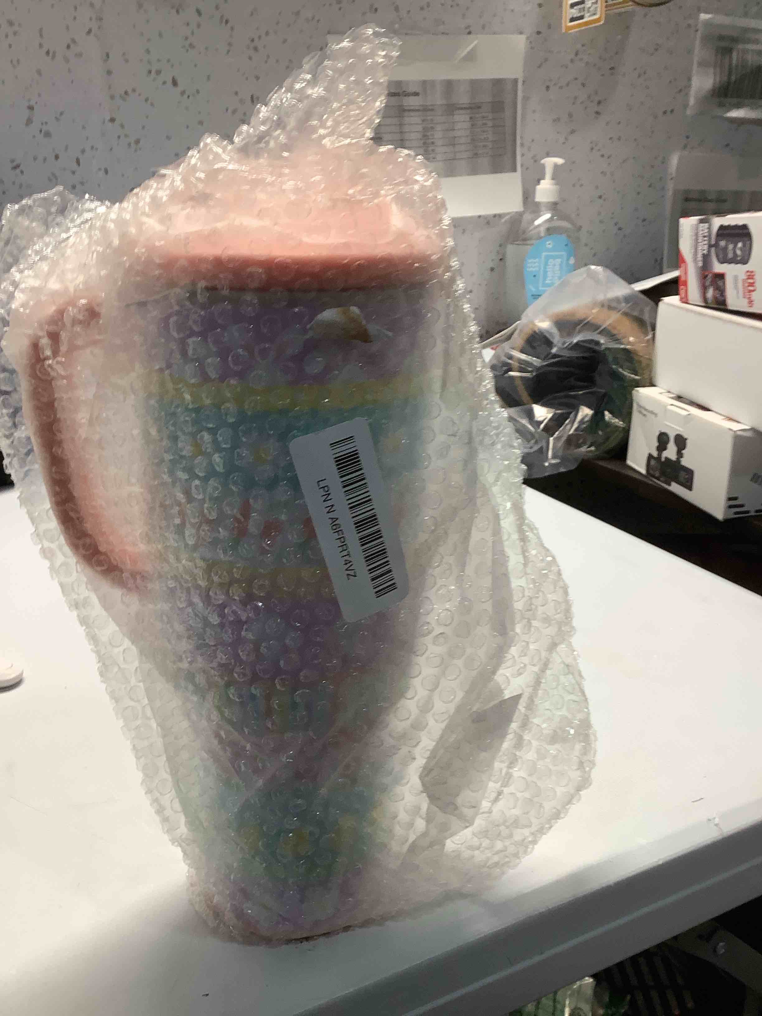 Condition photo showing Good Condition for Swig Life 40oz Mega Mug, 40 oz Tumbler with Handle and Straw, Cup Holder Friendly, Dishwasher Safe, Extra Large Insulated Tumbler, Easter Basket Stuffers, Easter Gifts for Women (Bunny Trail)