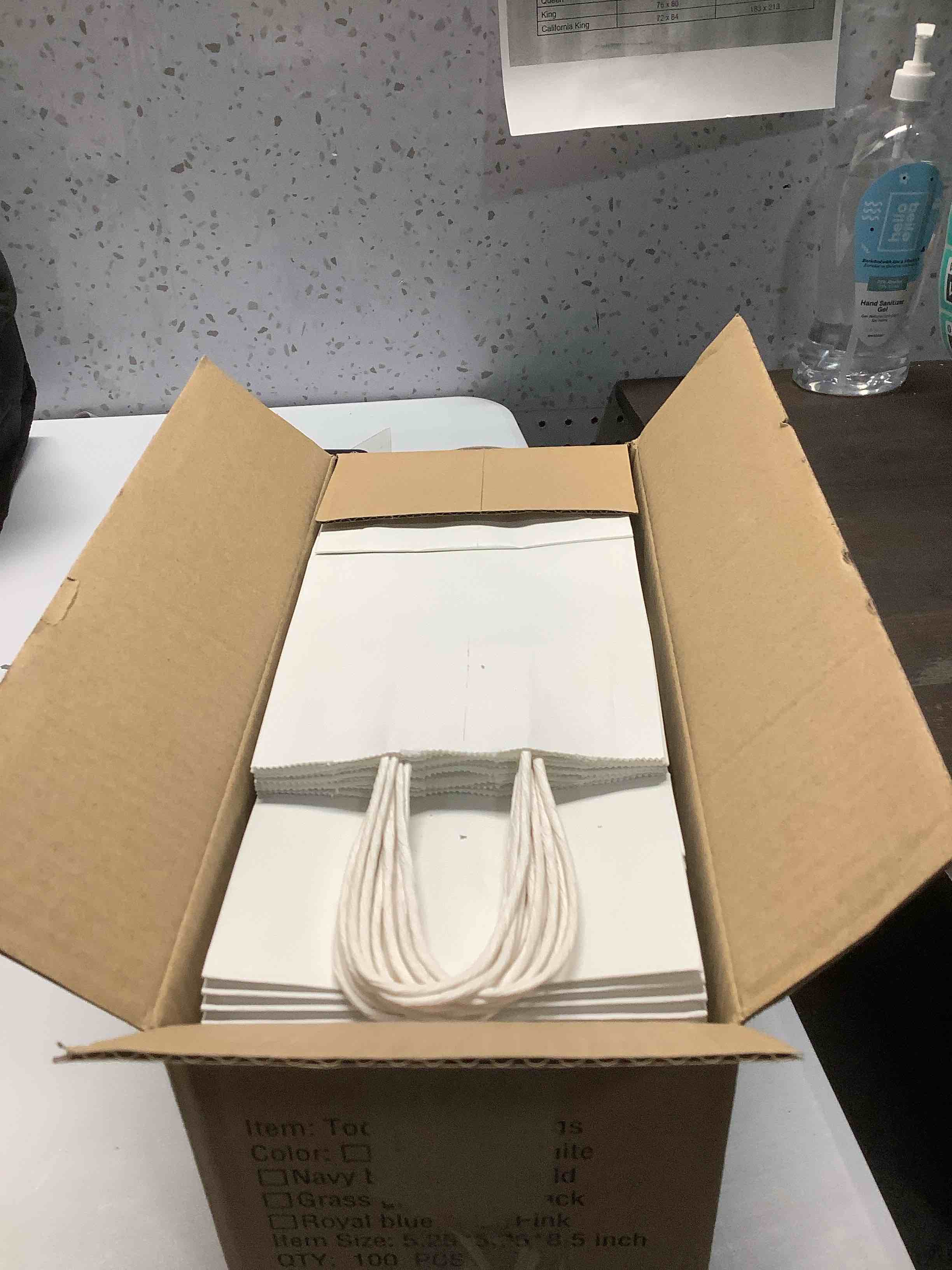 Condition photo showing Good Condition for Toovip 100 Pack 5.25x3.25x8.25 Inch Small White Kraft Paper Bags with Handles Bulk, Gift Wrap Bags for Favor Grocery Retail Party Birthday Shopping Business Goody Craft Sacks Merchandise Take Out Cub