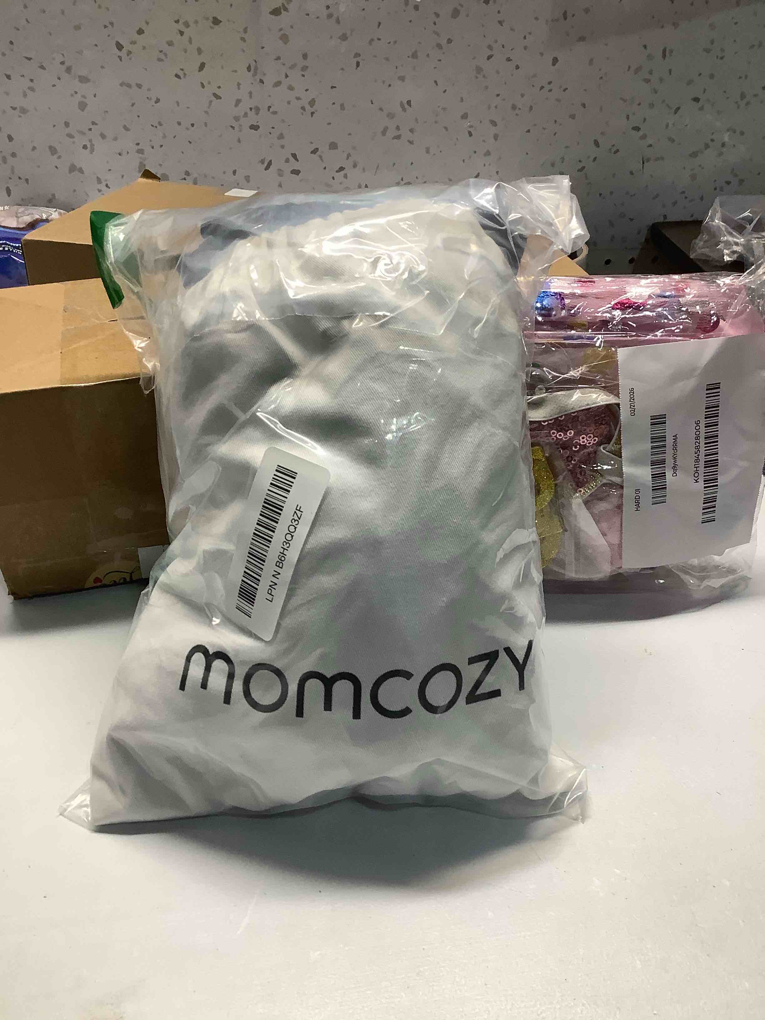 Condition photo showing Good Condition for Momcozy Baby Wrap Carrier, Easy to Wear Infant Carrier Slings, Lightweight Hands Free Baby Sling, Adjustable Baby Carriers for Newborn to Toddler 8-35 lbs, Black