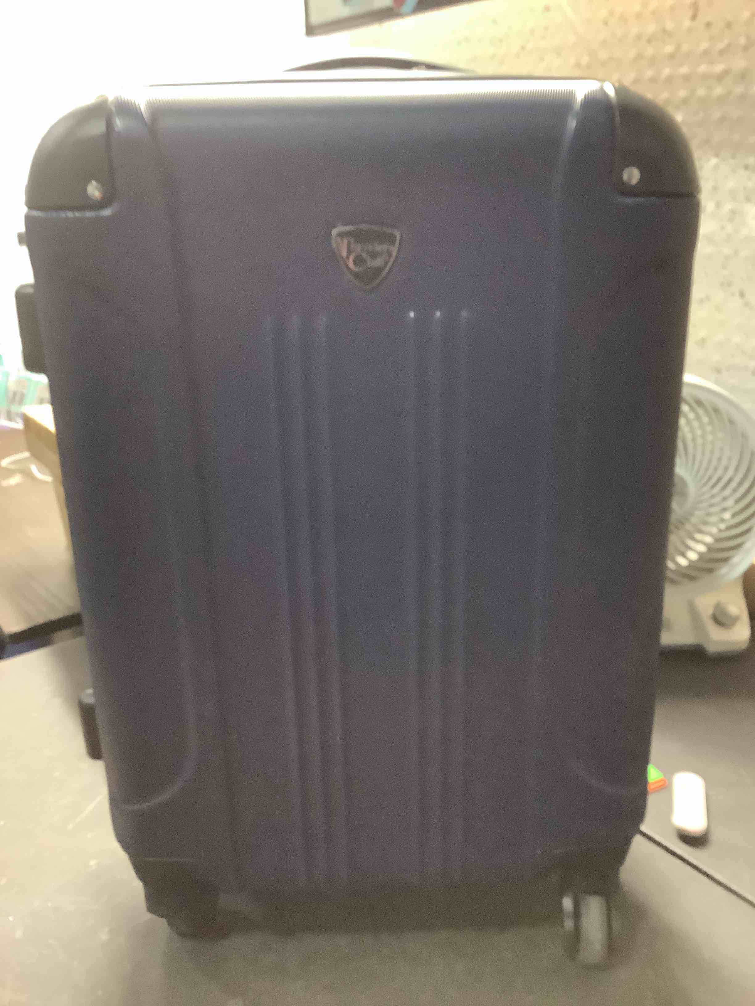 Condition photo showing Good Condition for size is 20” travelers club chicago hardside expandable spinner luggage, navy blue, 22" carry-on 22" carry-on navy blue