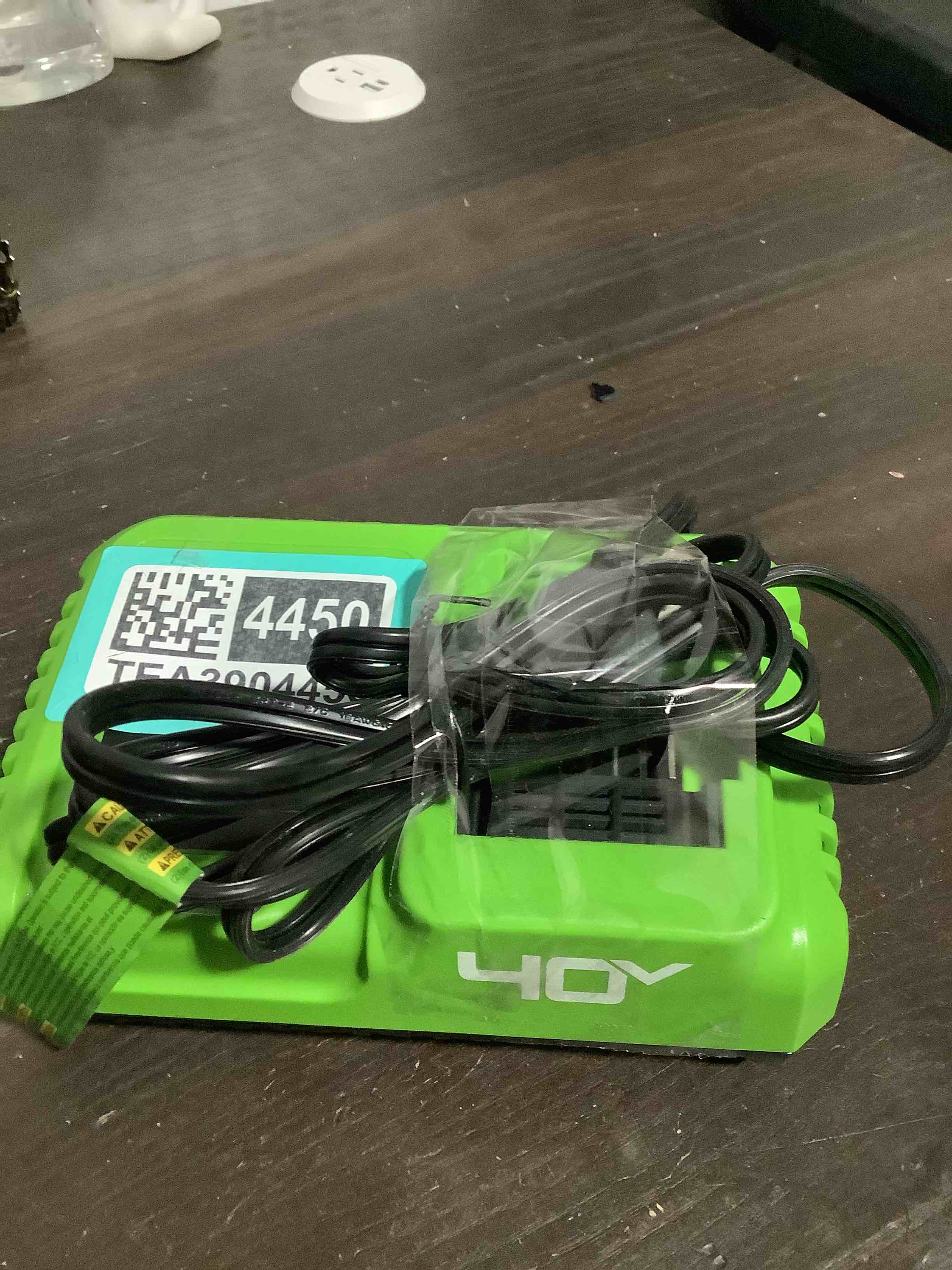 Condition photo showing As Is for greenworks 40v 5a rapid charger?for all greenworks 40v battery