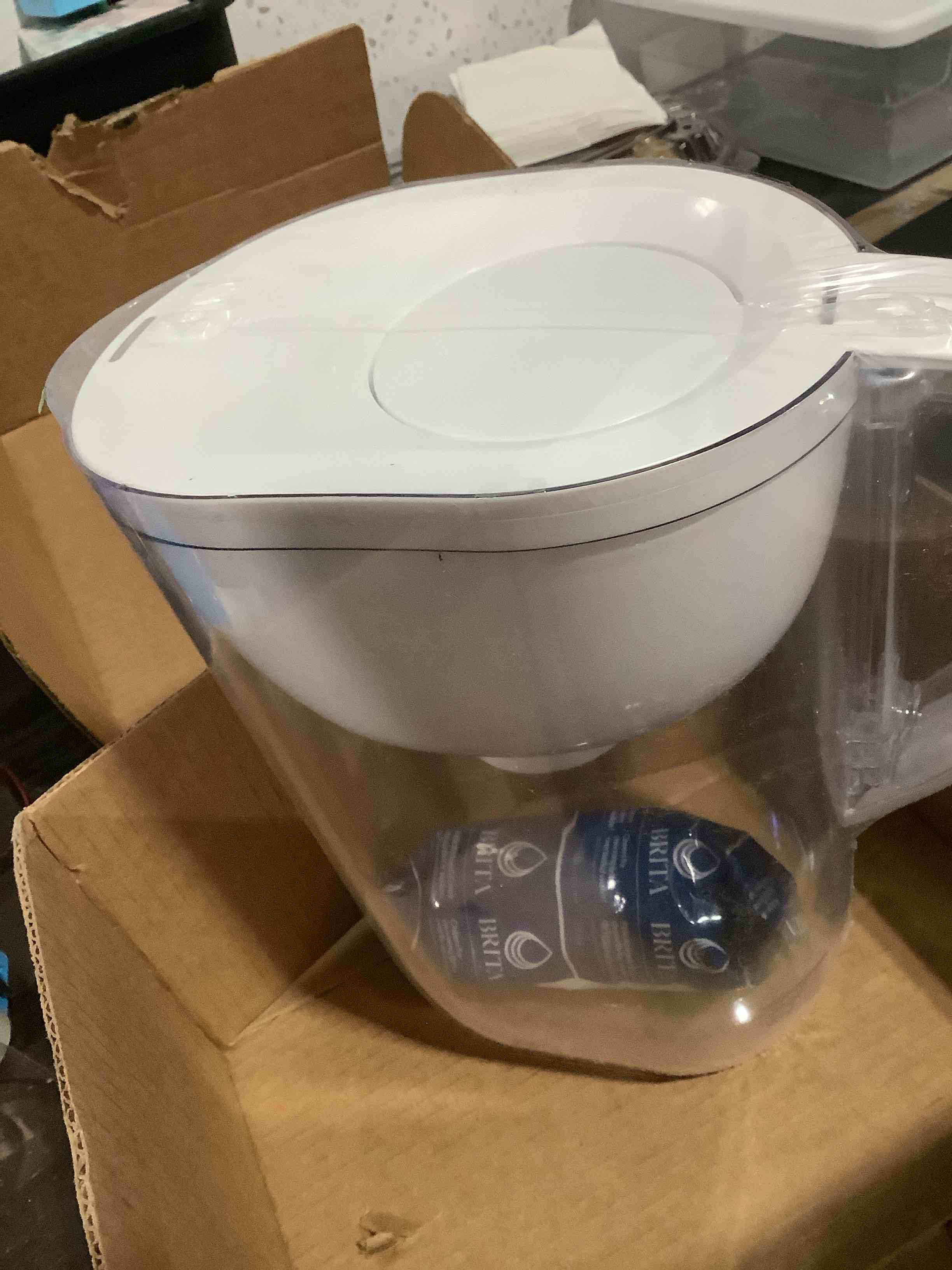 Condition photo showing New/Like New for brita water pitcher, everyday elite filter, removes 99% of lead, includes 1 filter, 10-cup capacity, white elite white