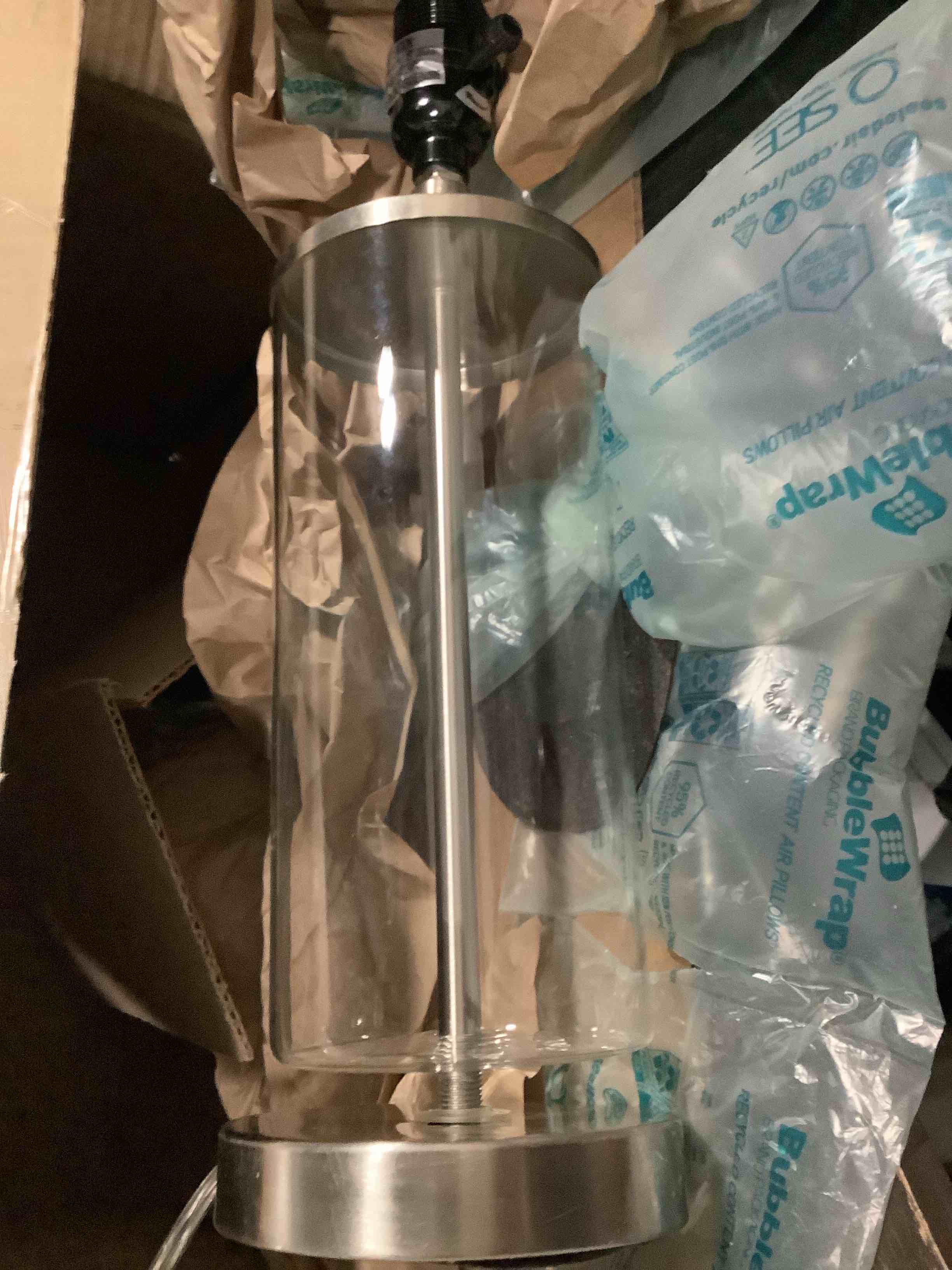 Condition photo showing As Is for globe electric 67155 maya 21" fillable table lamp, clear glass and steel base, white fabric shade steel, clear