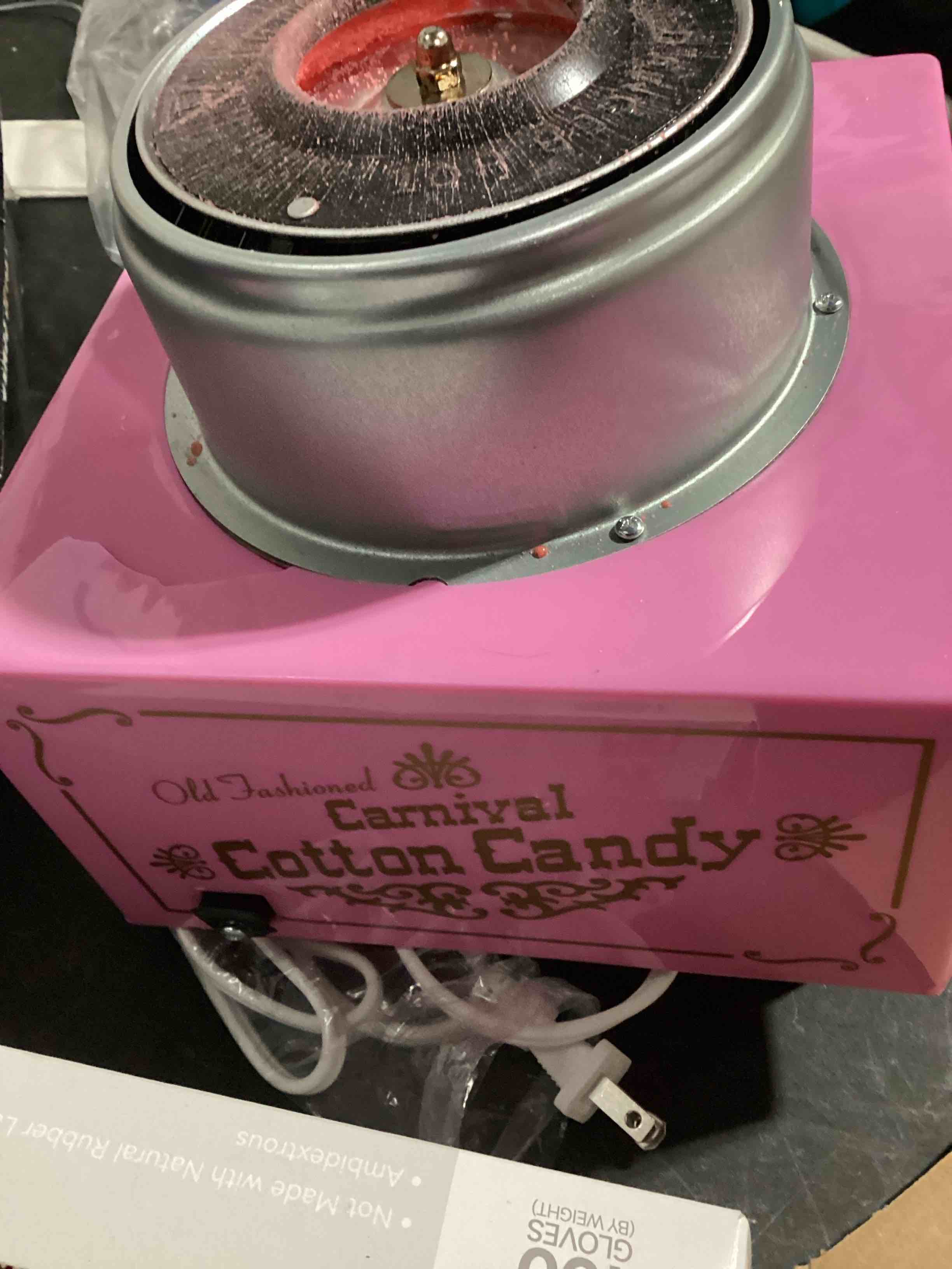 Condition photo showing As Is for nostalgia vintage cotton candy machine - countertop cotton candy maker with 2 reusable cones & 1 sugar scoop - use hard candy or sugar to create fluffy, delicious treats in minutes-pink