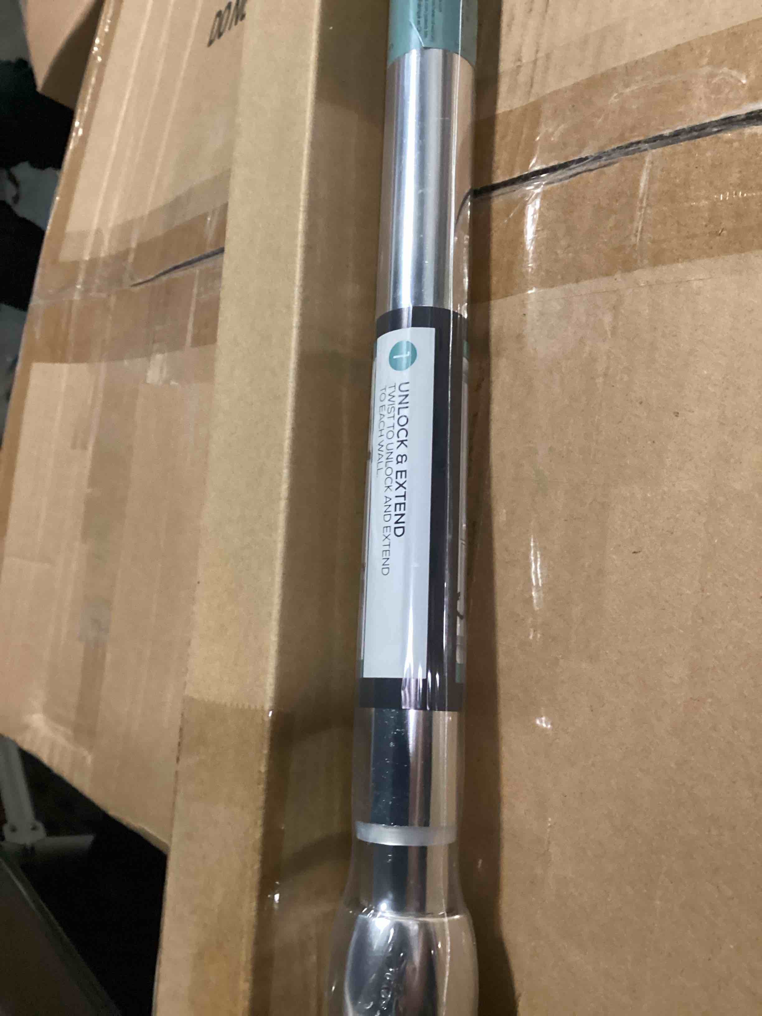 Condition photo showing New/Like New for zenna home neverrust adjustable tension shower curtain rod, rustproof and stall-sized, 30 to 43 inches, chrome 30" - 43" stall sized chrome