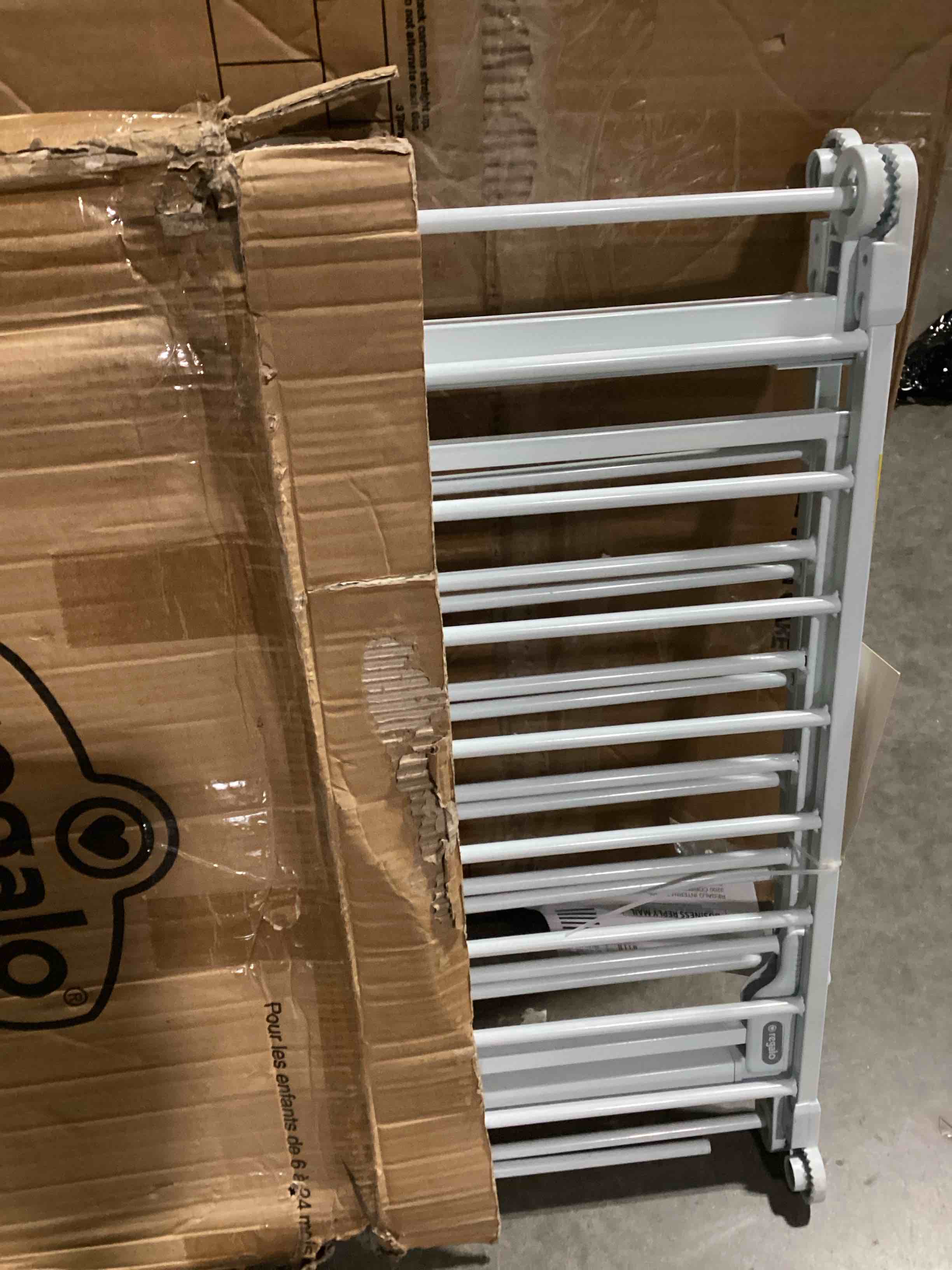 Condition photo showing Good Condition for regalo safety 28"-76” super wide configurable baby gate for doorways & open spaces, 3-panel wall mounted safety gate with door for babies, toddlers & pets, includes wall mount hardware 28-76"w x 30"h white
