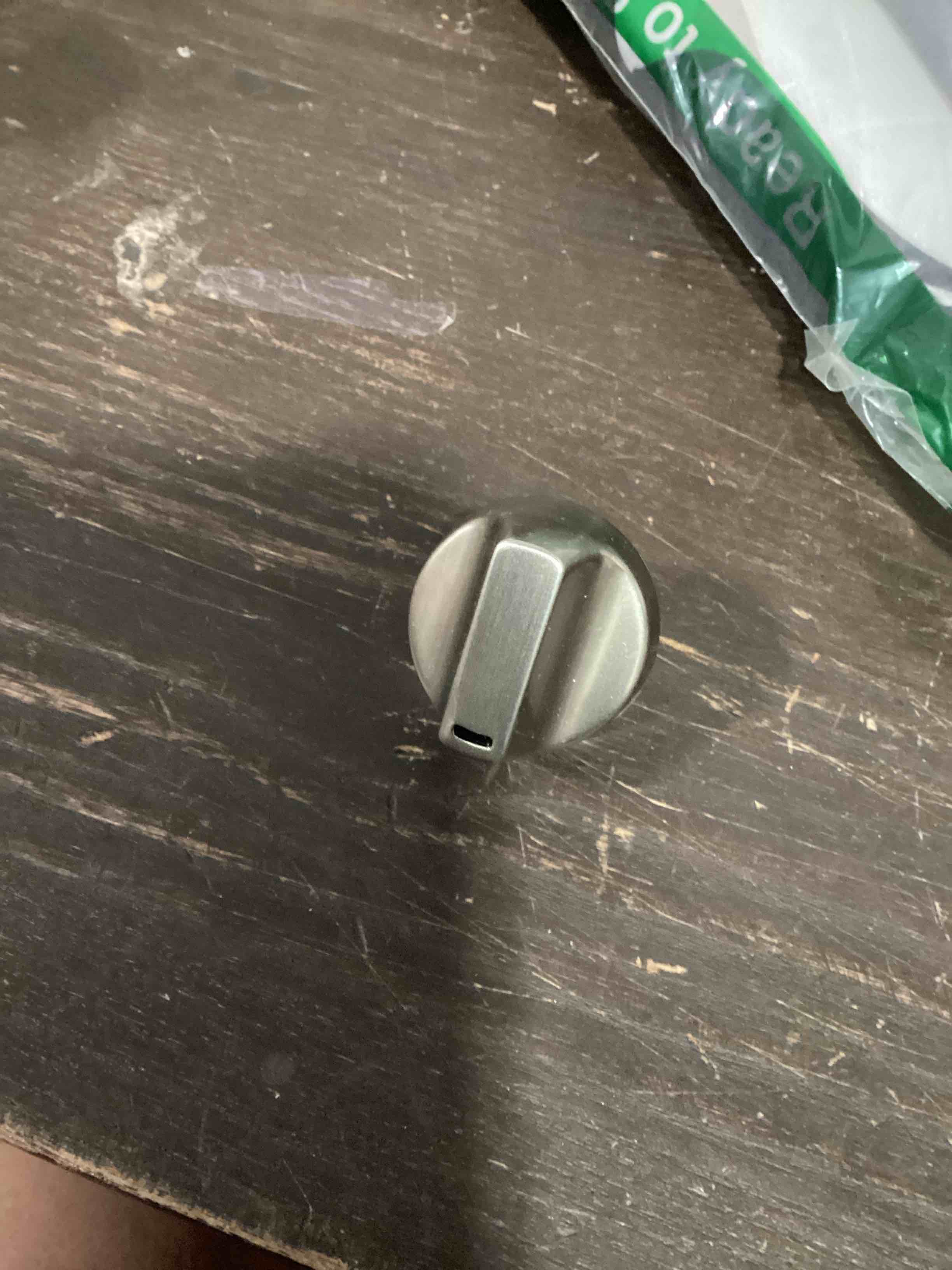 Condition photo showing Good Condition for ge wb03x29392 range surface burner knob (stainless steel)