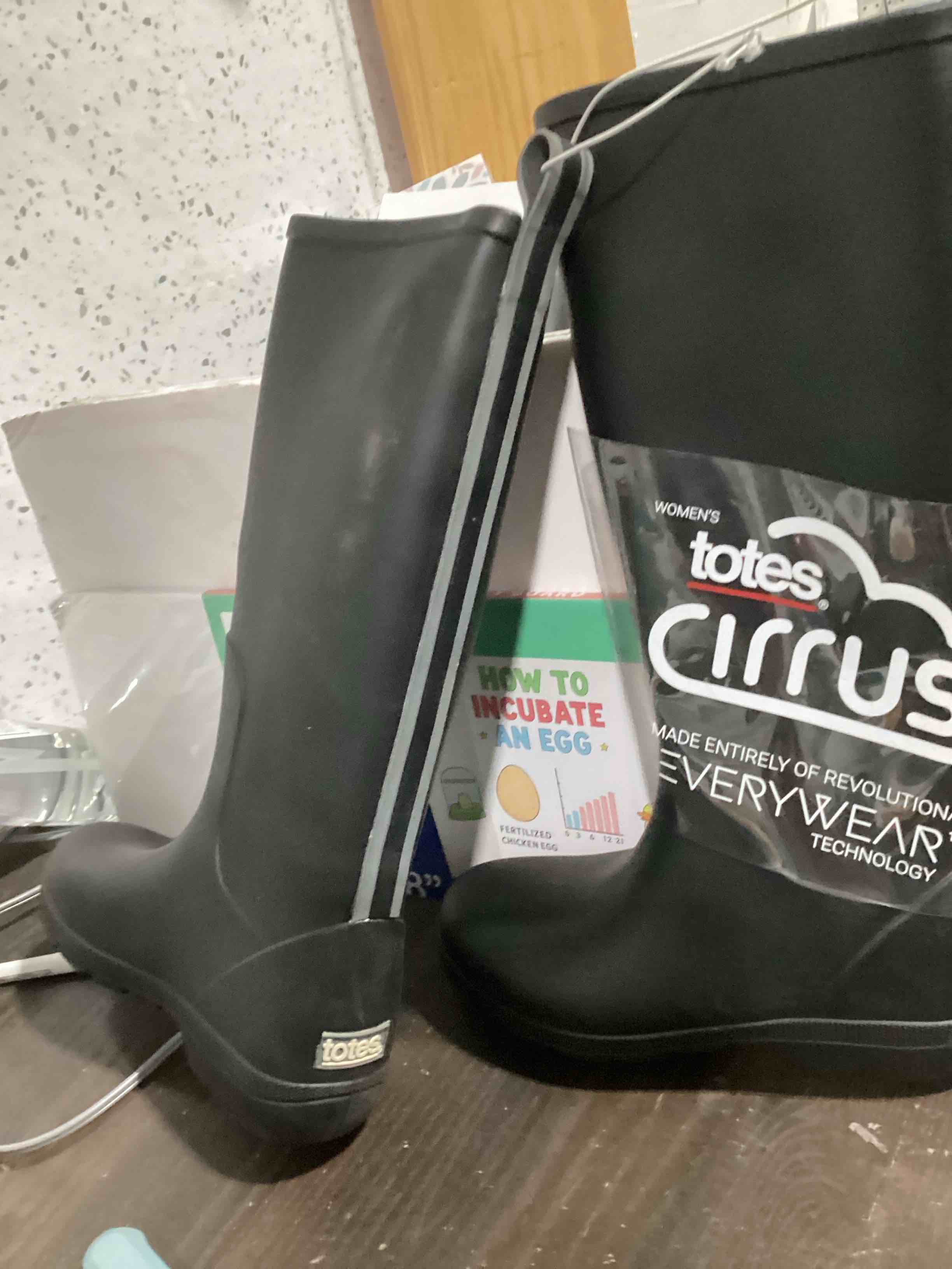 Condition photo showing New/Like New for totes women’s cirrus rain boots size 8