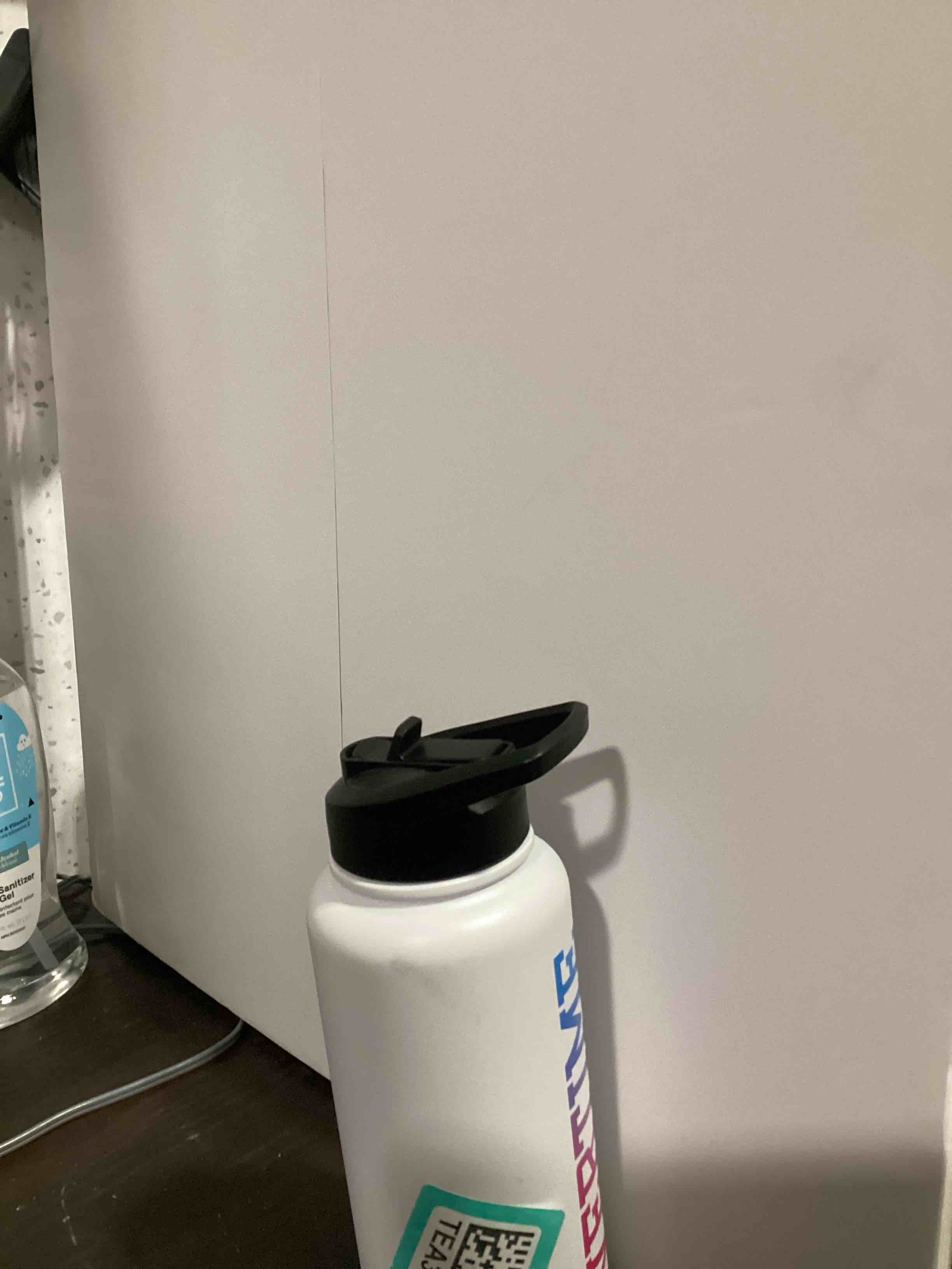 Condition photo showing Good Condition for overtime, white /black stainless steel water bottle