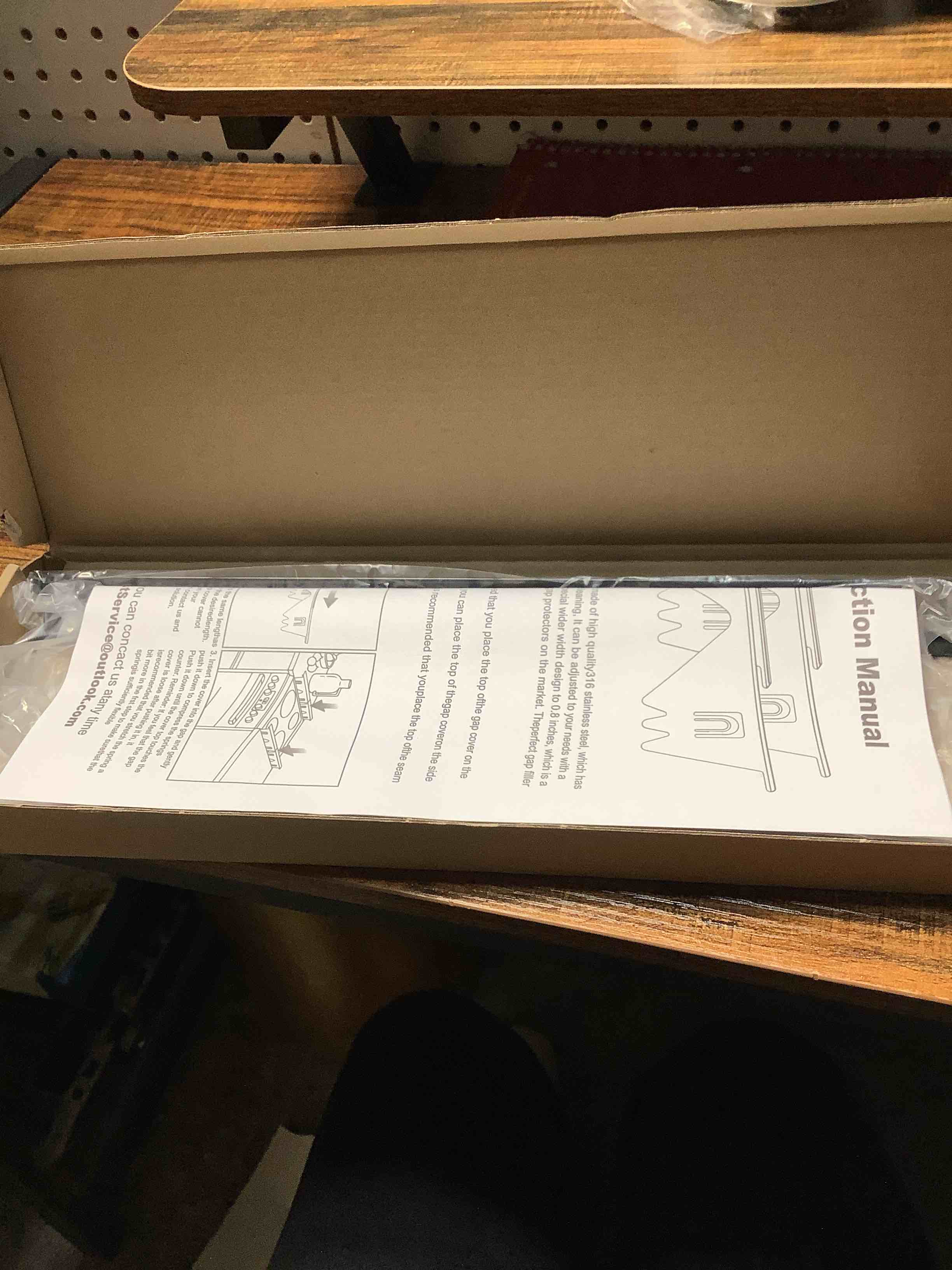 Condition photo showing Good Condition for Stainless Steel Stove Gap Covers - Stove Gap Filler, Easy retractable Length 13.8" to 27.5", Width 0.79", Heat Resistant Guard Between Stove Top & Counter, 2Pck Black