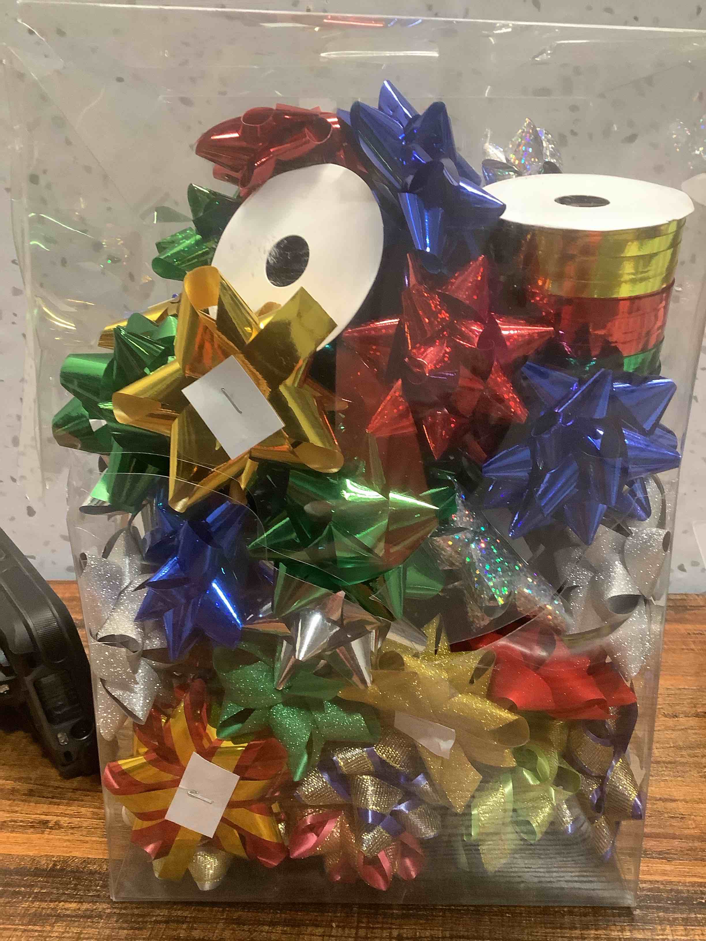 Condition photo showing Good Condition for JOYIN 75 PCS 3 Inch Christmas Self Adhesive Gift Bows and 2 Rolls of Christmas Curling Ribbons for Baskets, Wine Bottles Decoration, Gift Wrapping and Decoration Present Golden, Blue, Green, Red, Silver 3 IN 75 PCS