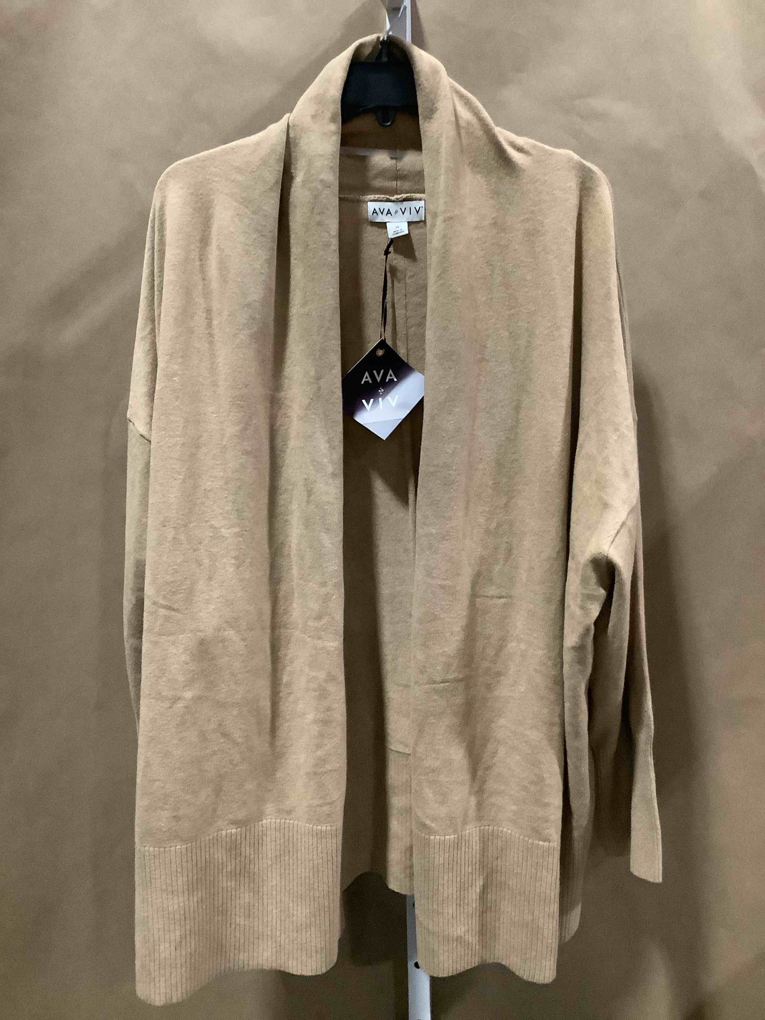 Condition photo showing New/Like New for ava & viv soft tan cardigan size 2x