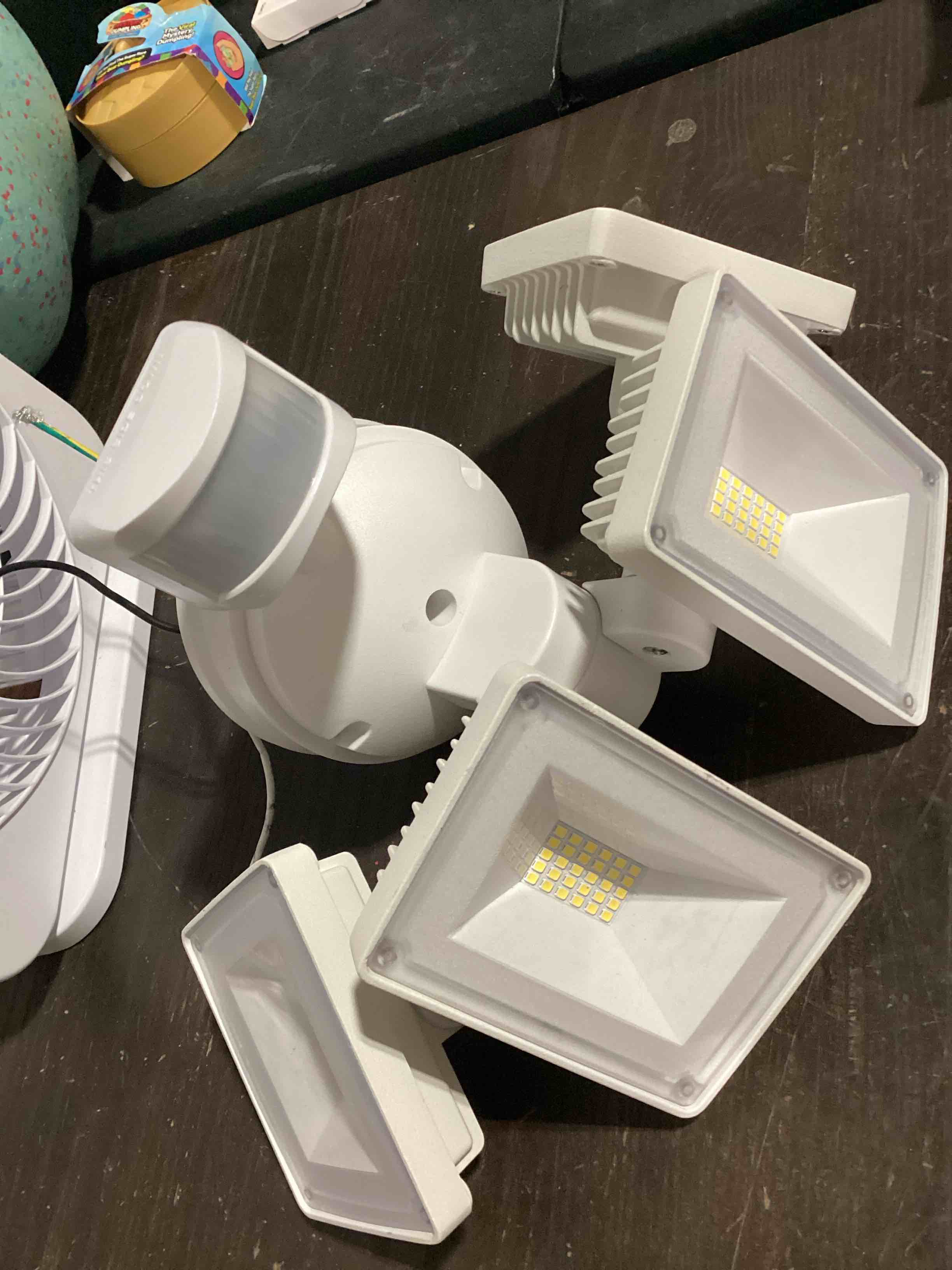 Condition photo showing As Is for onforu 75w led flood light motion sensor outdoor, 7000lm dusk to dawn flood light, security light with three head, ip65 waterproof exterior floodlight, 6500k wall light for entryway stairs yard garage white