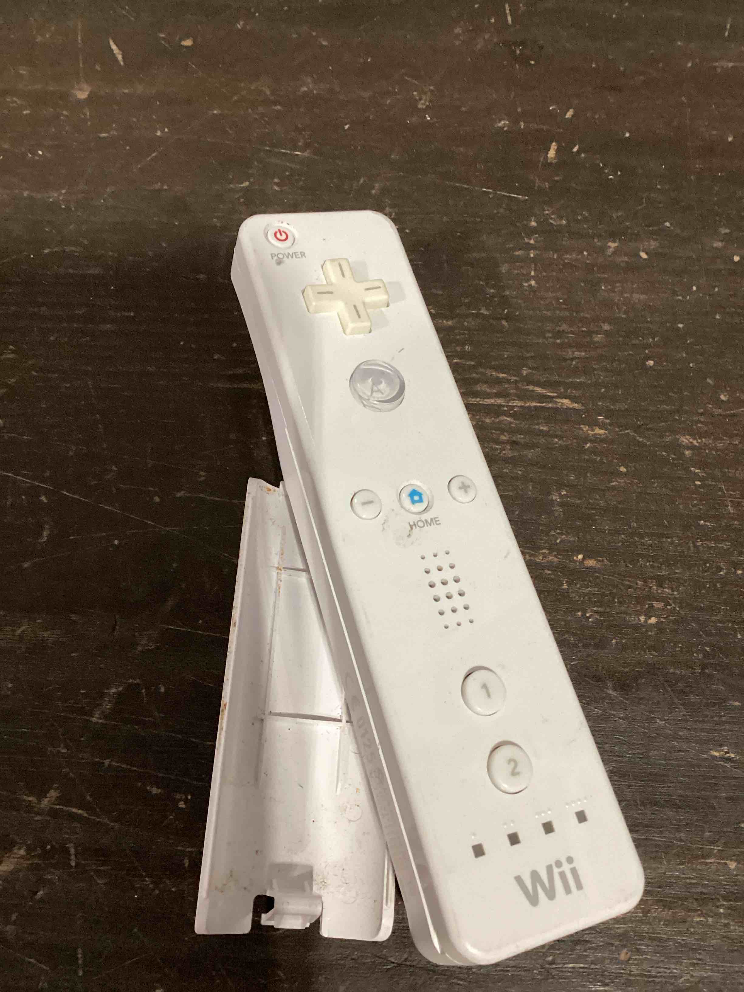 Condition photo showing As Is for wii remote controller white