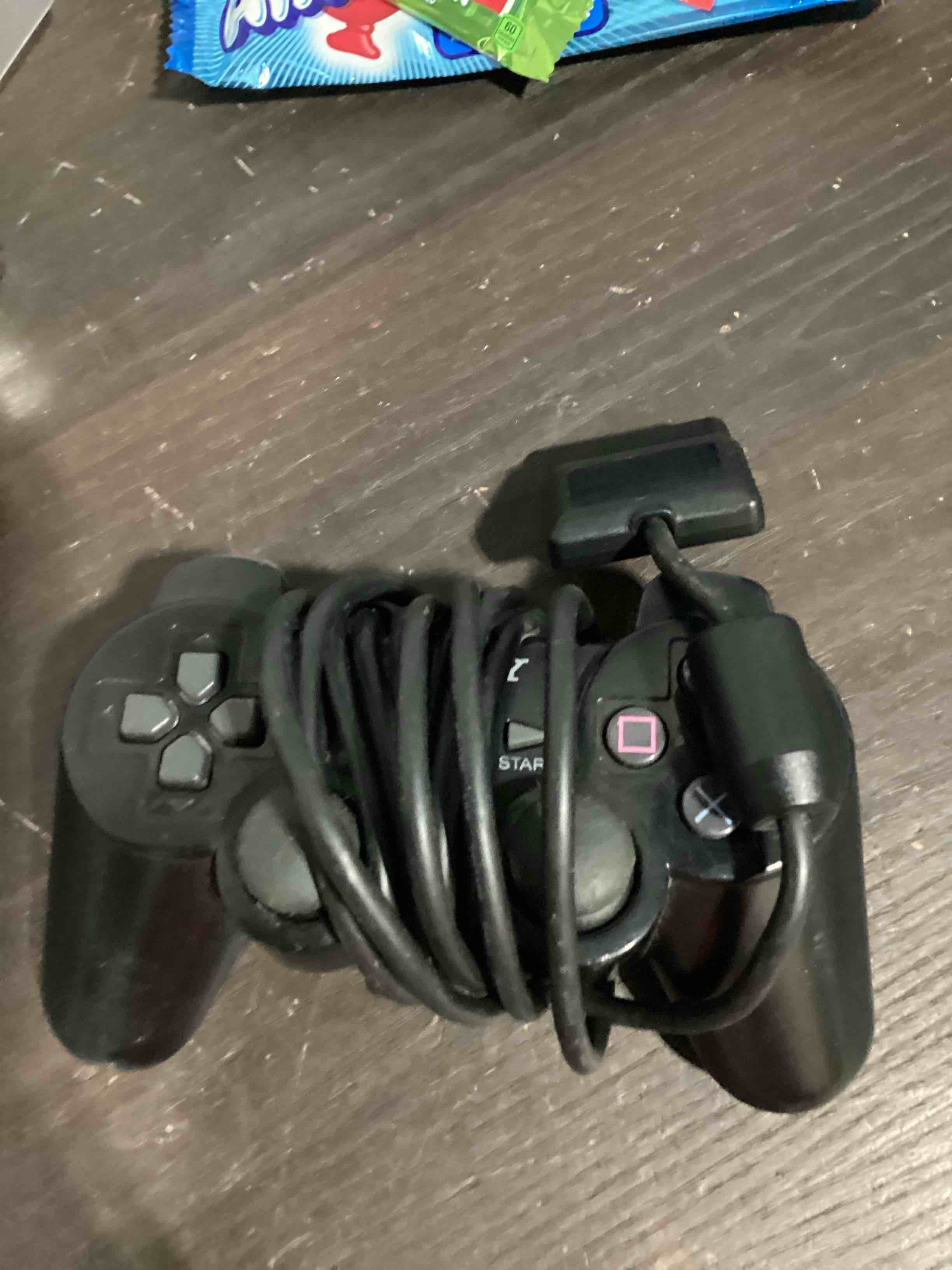 Condition photo showing As Is for wired controller double shock for playstation 2 ps2 black