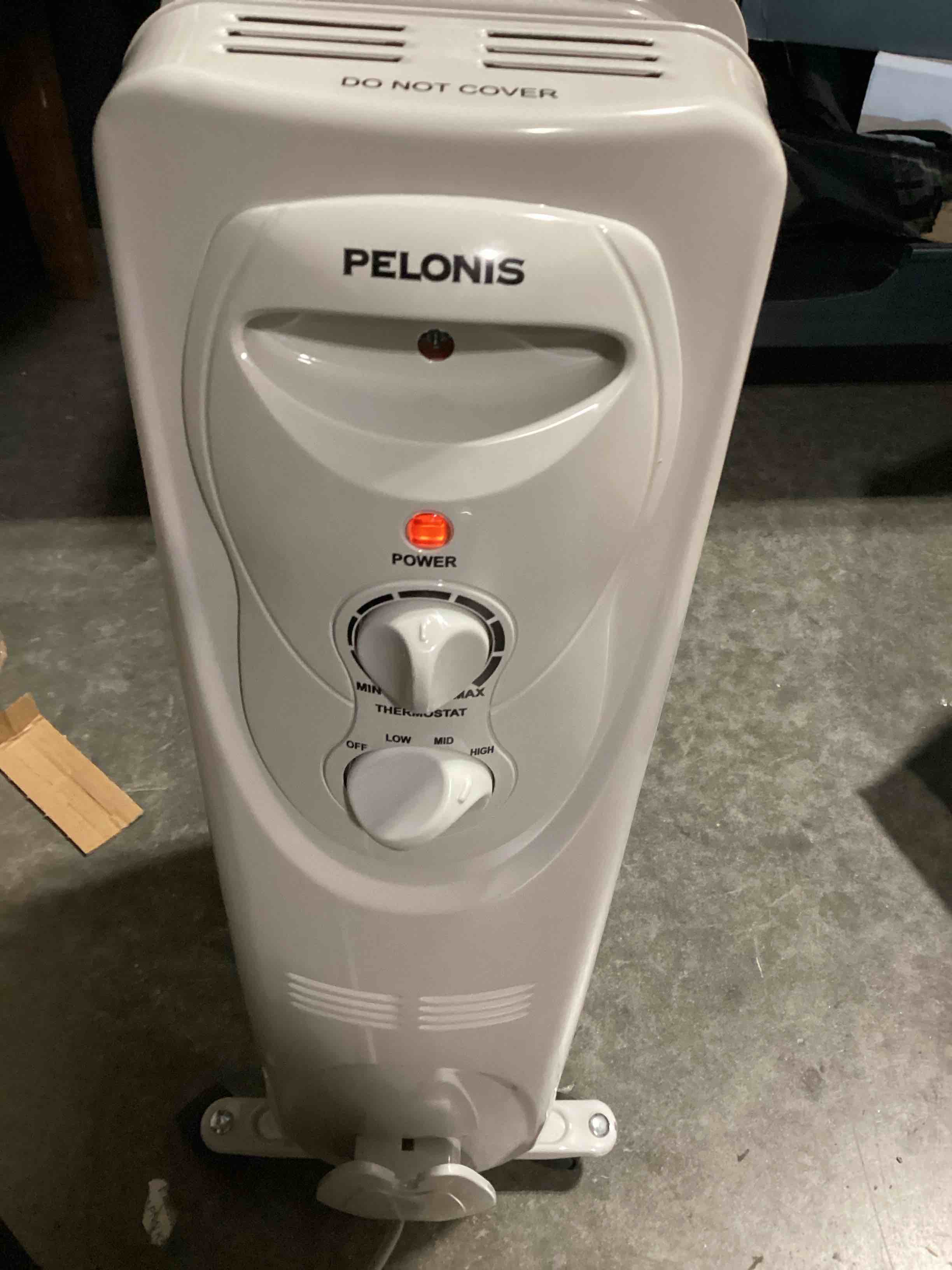 Condition photo showing Good Condition for pelonis oil filled radiator heater for indoor use large room safe with thermostat, 1500w energy efficient quiet space heater, 3 heat settings, overheat & tip-over, white