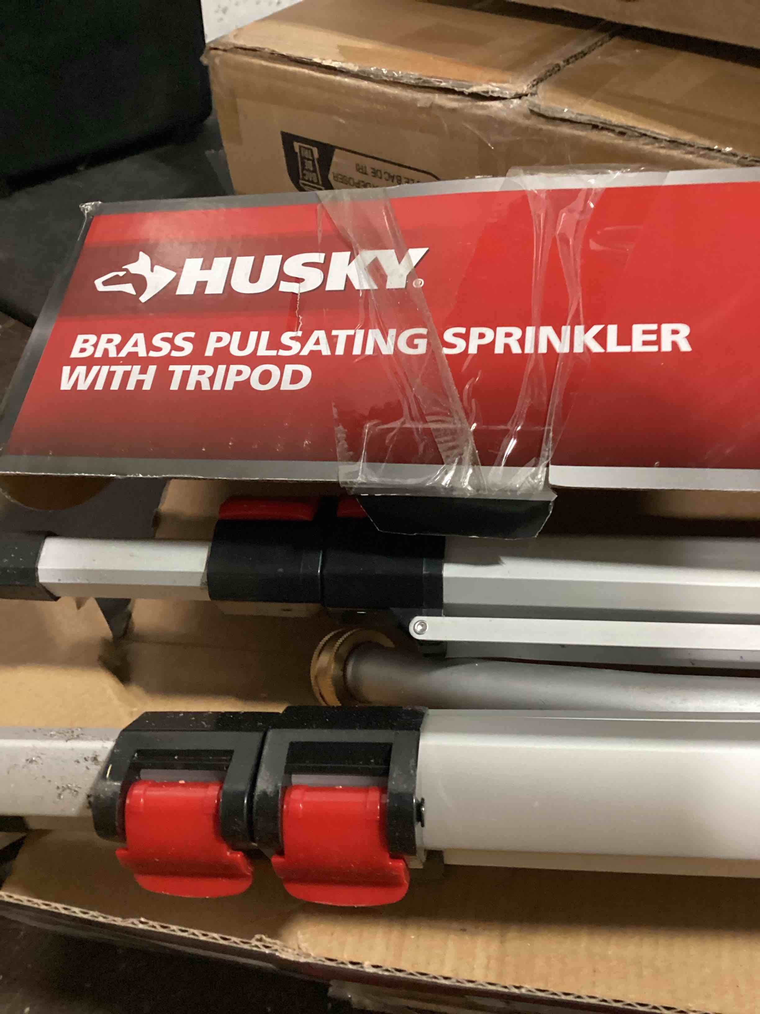 Condition photo showing As Is for metal pulsating sprinkler with tripod