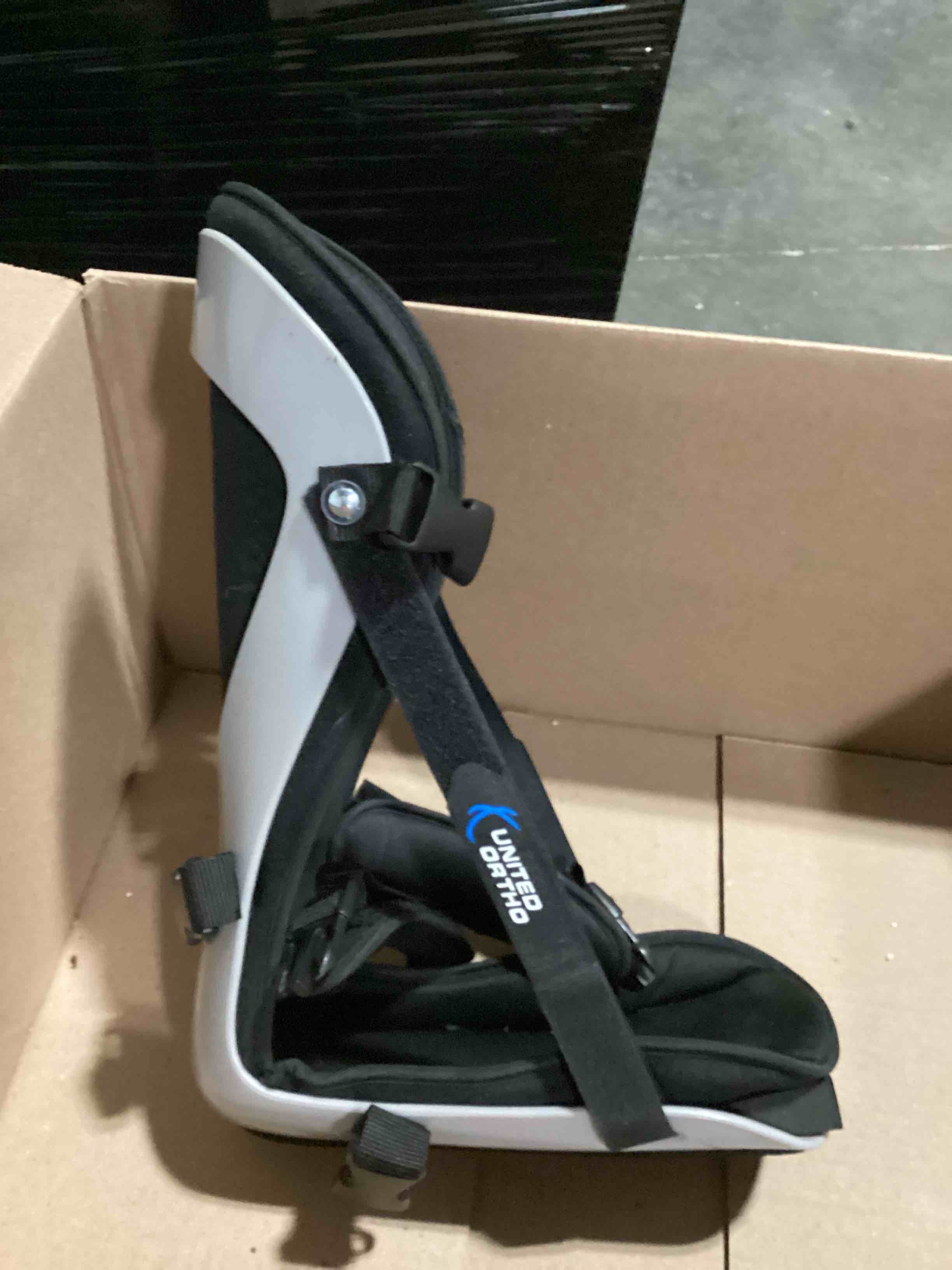 Condition photo showing Good Condition for united ortho plantar fasciitis adjustable leg support brace fits right or left foot for soreness relief, foot pain and stretching, medium, black black medium leg support brace