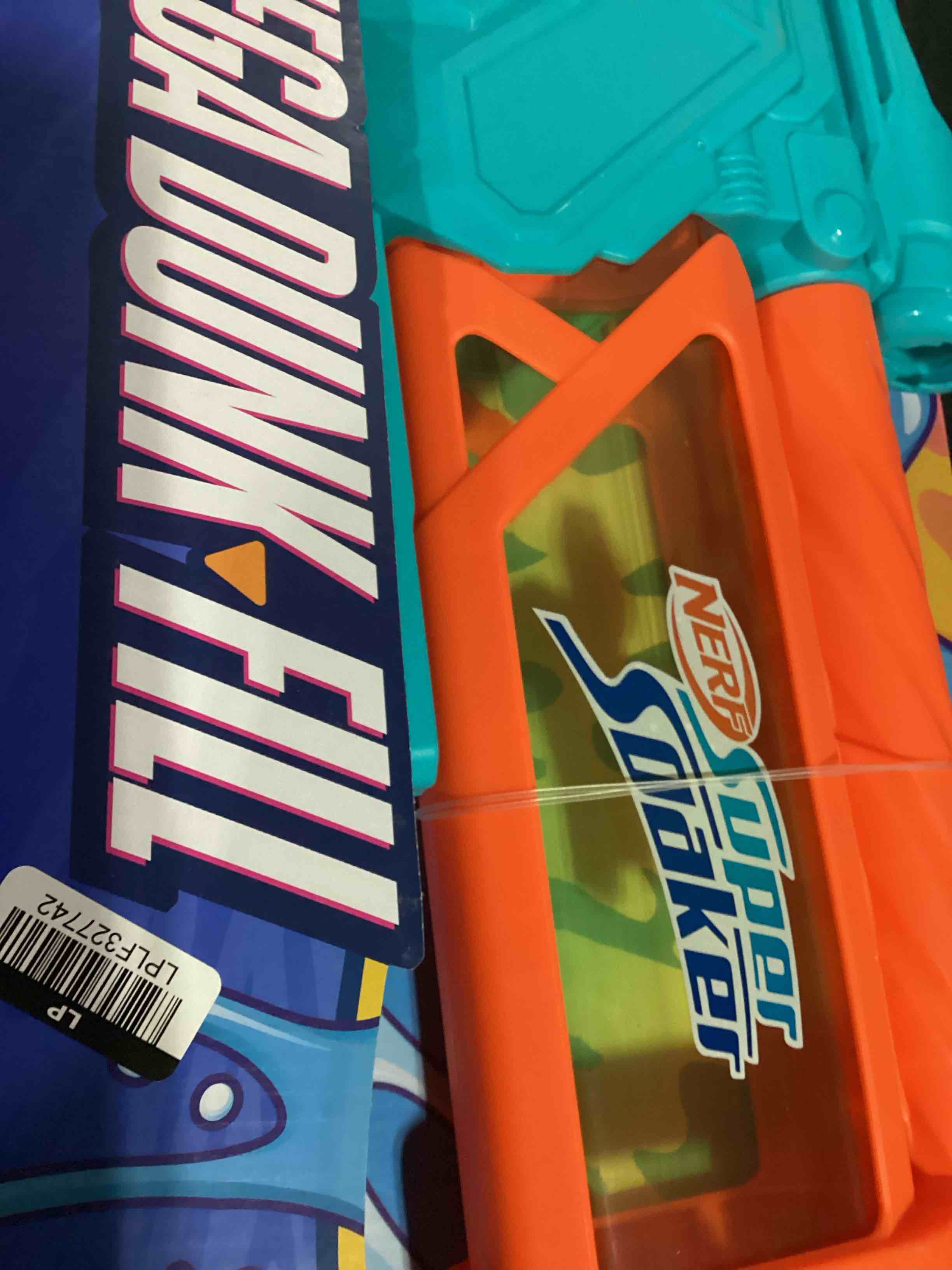 Condition photo showing New/Like New for hasbro mega dunk-fill water blaster