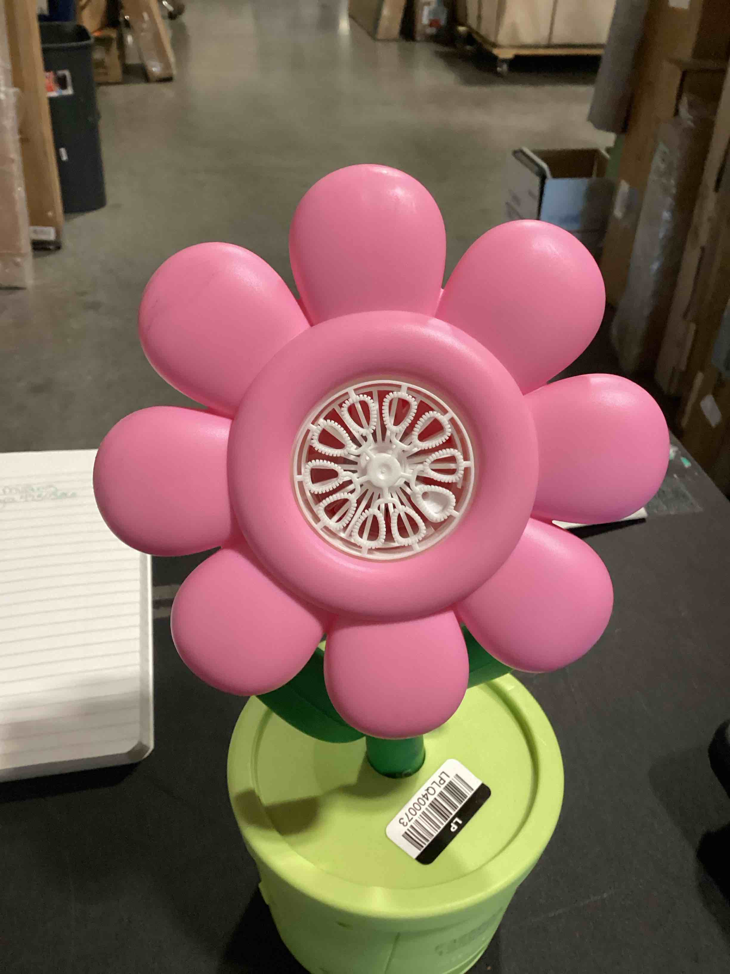 Condition photo showing As Is for pink sunflower bubble **color is pink** machine with led and music, electric bubble maker for, battery powered bubble blower with 20000 bubbles per minute, portable bubble machine for indoor outdoo