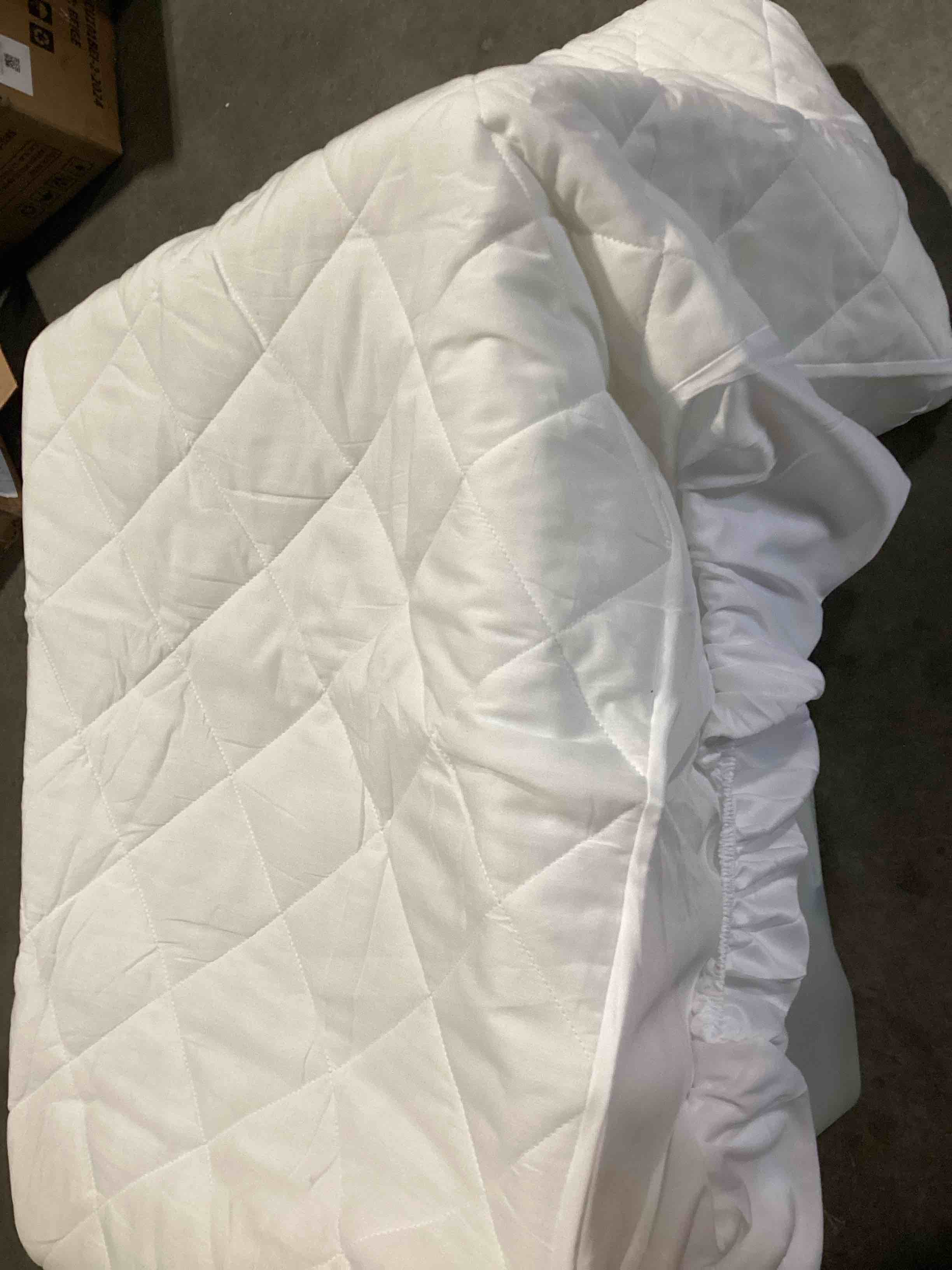 Condition photo showing Good Condition for utopia bedding quilted fitted mattress pad, twin size, elastic fitted mattress topper protector and cover with deep pocket stretches up to 16 inches, machine washable (white) white twin (pack of 1)