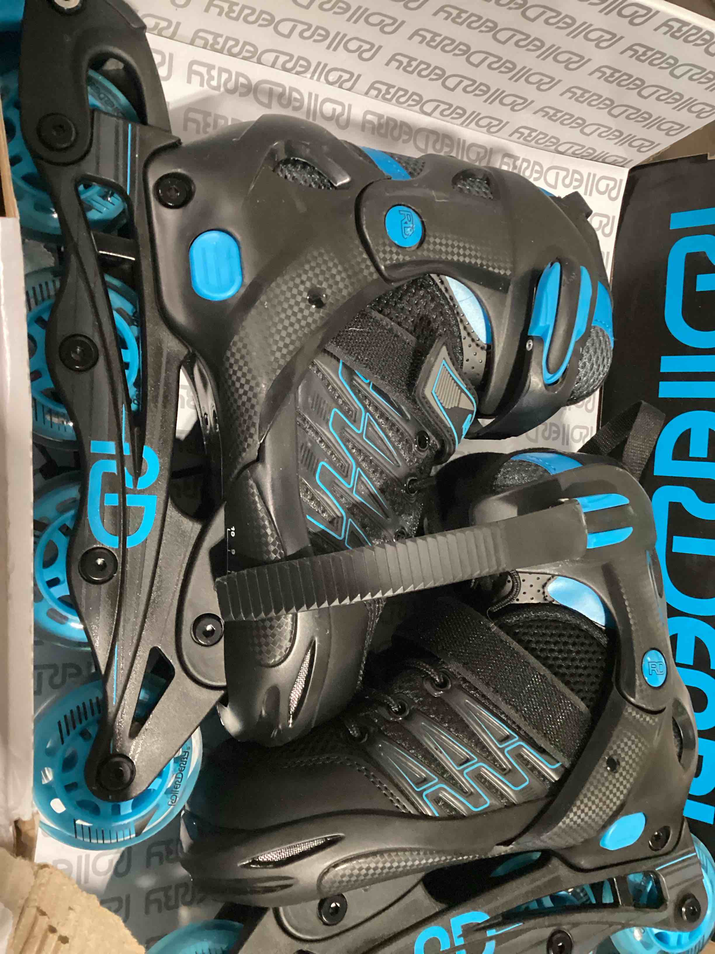 Condition photo showing Good Condition for roller derby custom adult in-fit skates - blue/black 7-10: adjustable, padded boot shaft