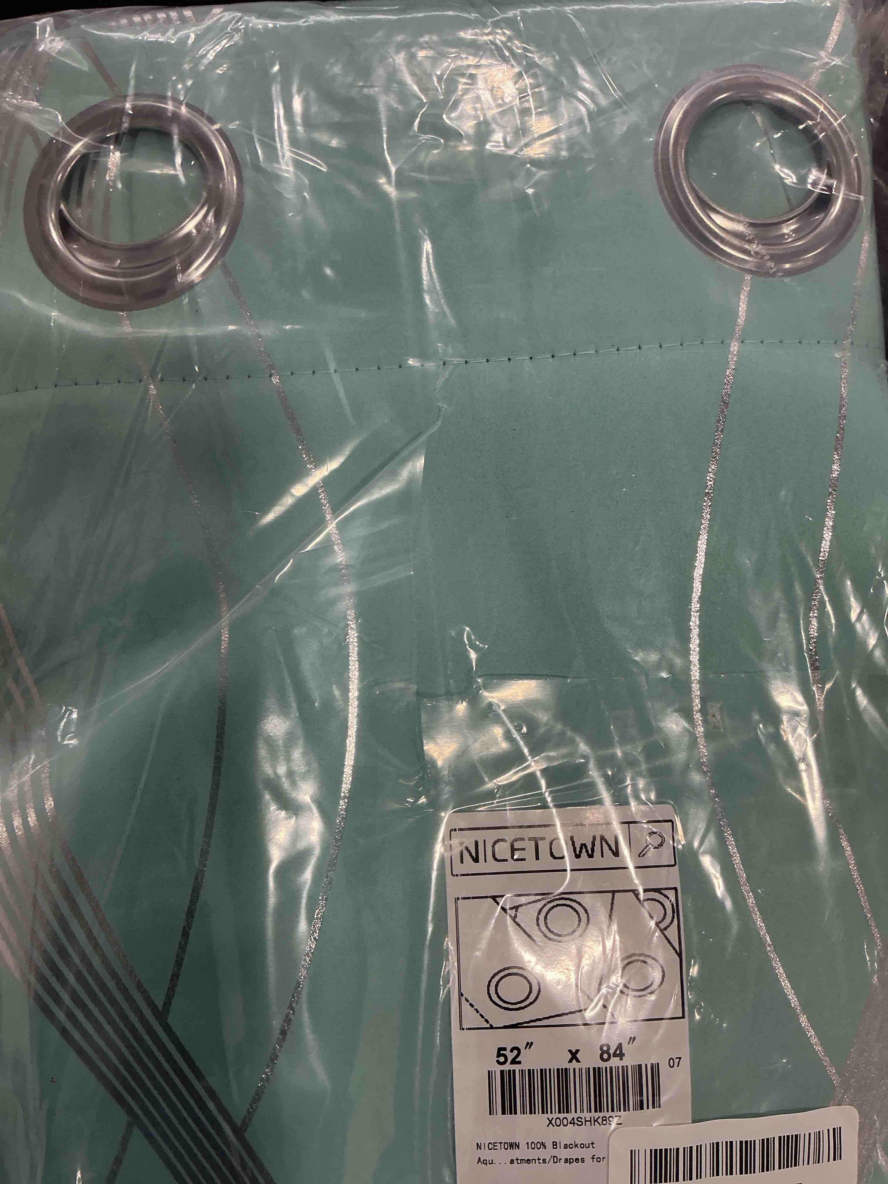 Condition photo showing Good Condition for NICETOWN 100% Blackout Aqua Blue Curtain Wave Pattern Panels 84 inches 2 Pieces, 52 inches Wide Light Reducing Thermal Insulated Solid Grommet Window Treatments/Drapes for Nursery 100% Blackout - Aqua Blue 52"W x 84"L (Pack of 2)