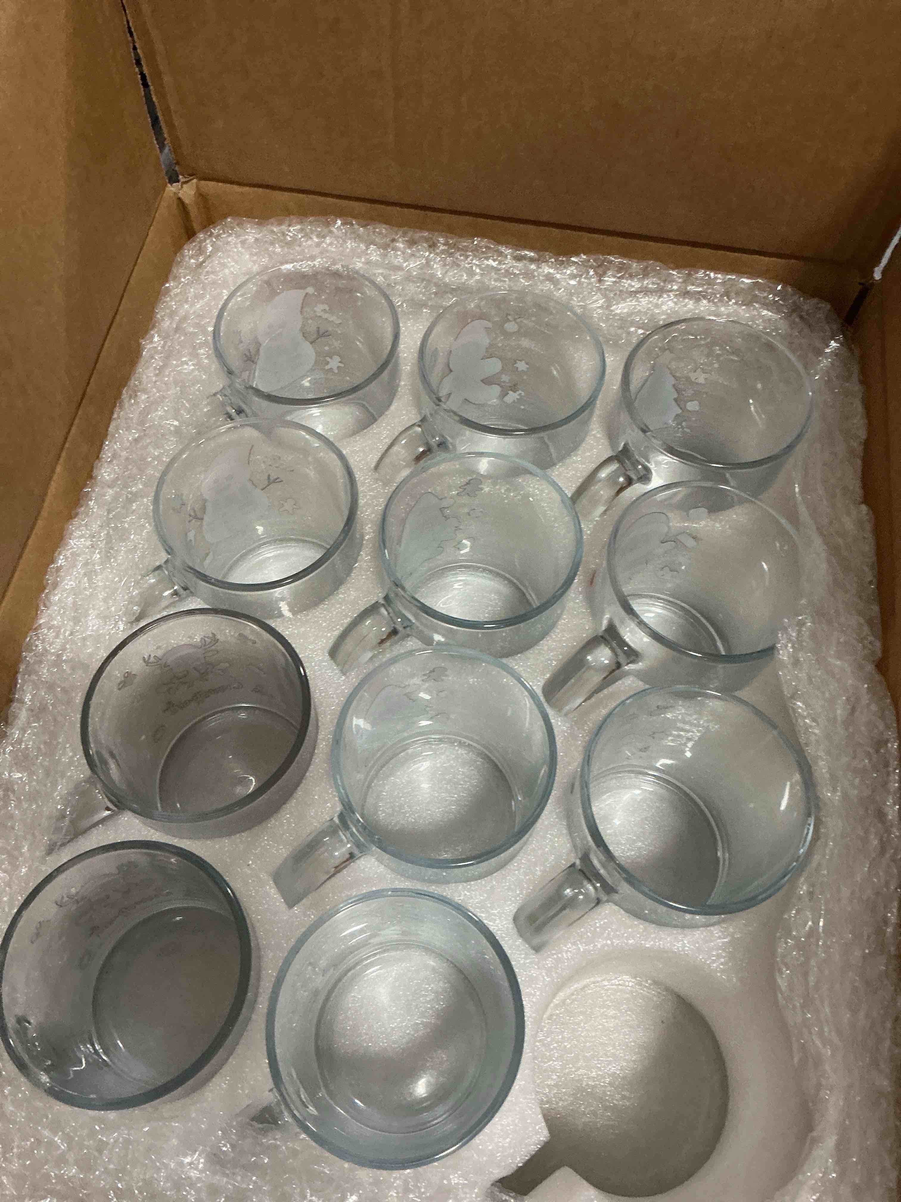 Condition photo showing As Is for Baderke 12 Pcs Christmas Glass Mugs Set 12 oz Christmas Coffee Mugs with Handle Snowman Snowflake Coffee Cup Xmas Tree Santa Claus Cup for Hot Chocolate Women Men Gift (Xmas) 12 Xmas