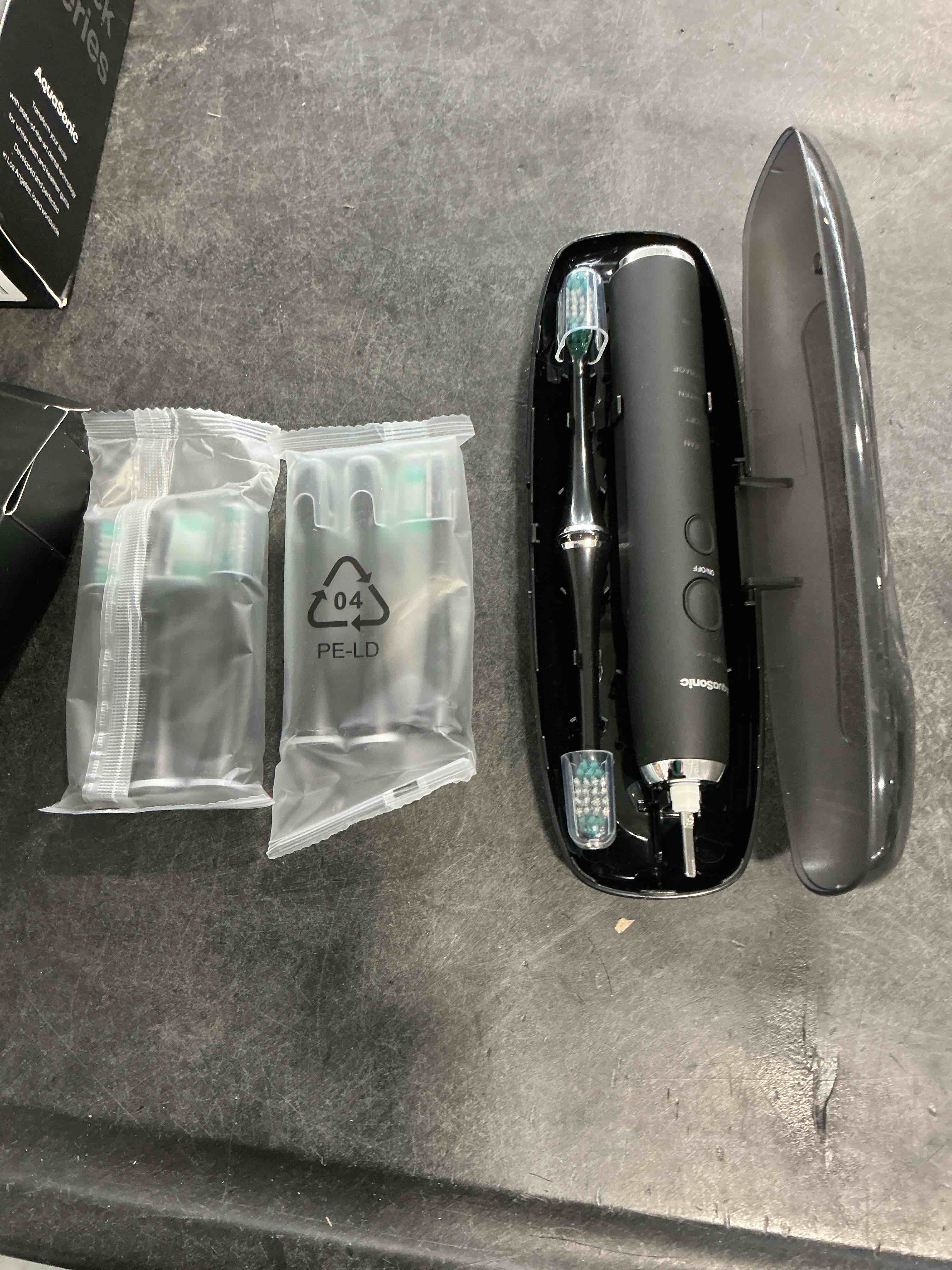 Condition photo showing New/Like New for Aquasonic Black Series Ultra Whitening Toothbrush – ADA Accepted Electric Toothbrush- 8 Brush Heads & Travel Case – 40,000 VPM Electric Motor & Wireless Charging - 4 Modes w Smart Timer