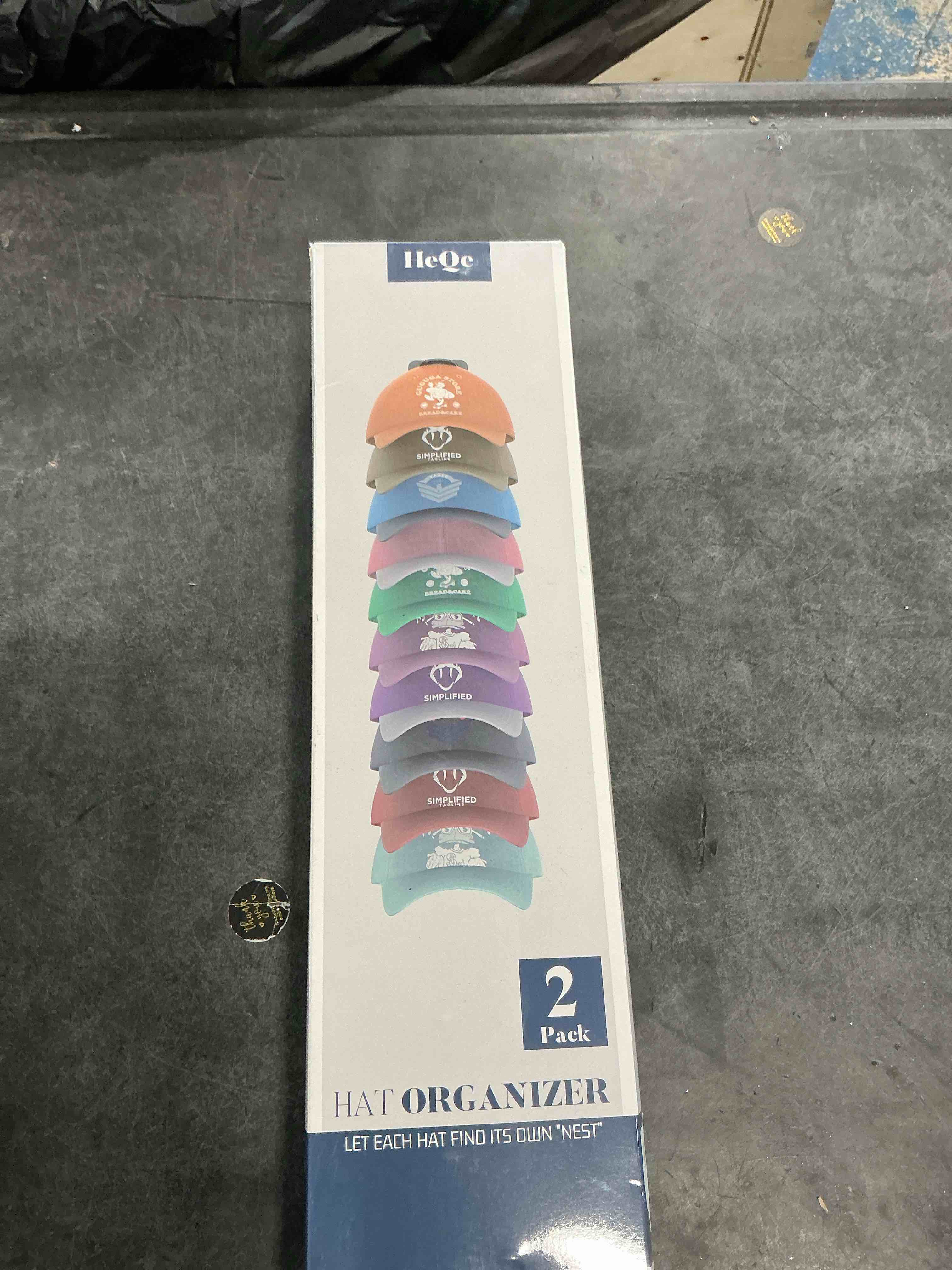 Condition photo showing New/Like New for Hat Organizer for Baseball Caps Hold Up to 40 Hats, 2 Pack Hat Rack for Wall, Strong Adhesive Hat Storage Display Holder(White-2 Pack) White 2 Pack