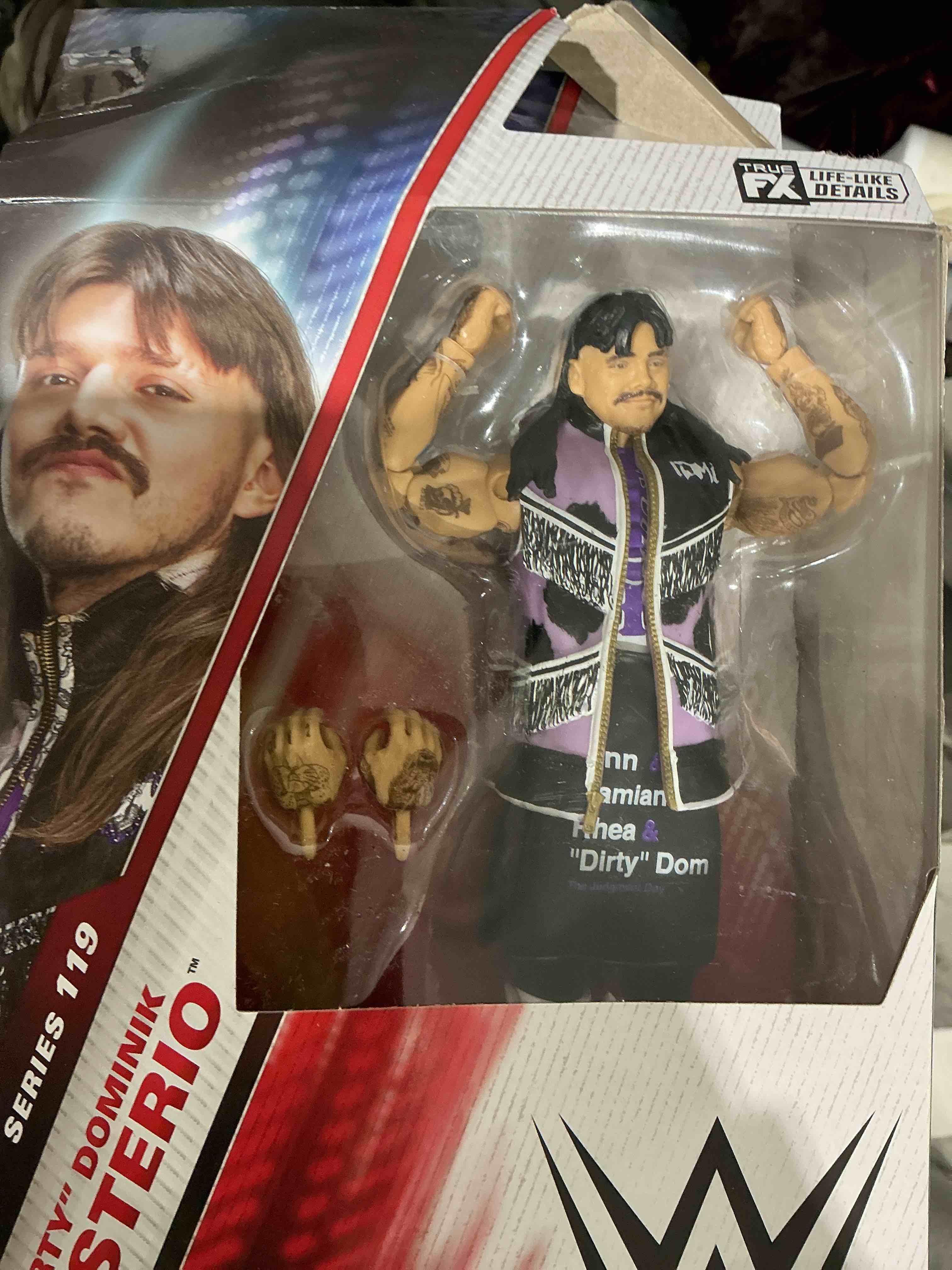 Condition photo showing Good Condition for Mattel WWE Elite Action Figure & Accessories, Series #119, 6-inch Collectible Dominik Mysterio with 25 Articulation Points & Swappable Hands