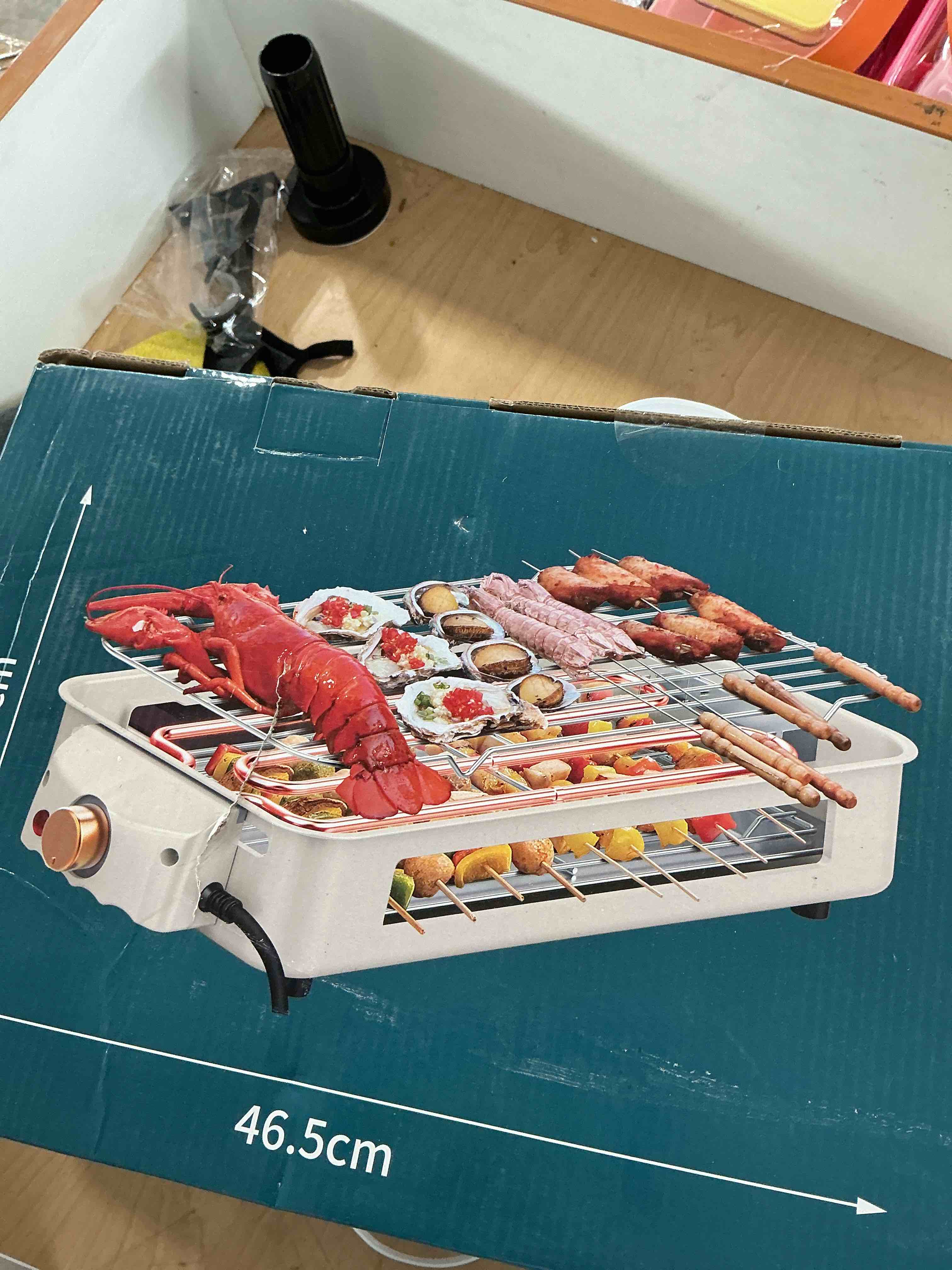 Condition photo showing New/Like New for ovente 2-in-1 electric indoor grill, 1500w smokeless korean bbq griddle with non-stick removable cooking plate, 3 raclette cheese pans, adjustable temperature control, dishwasher safe, beige bqr1502b