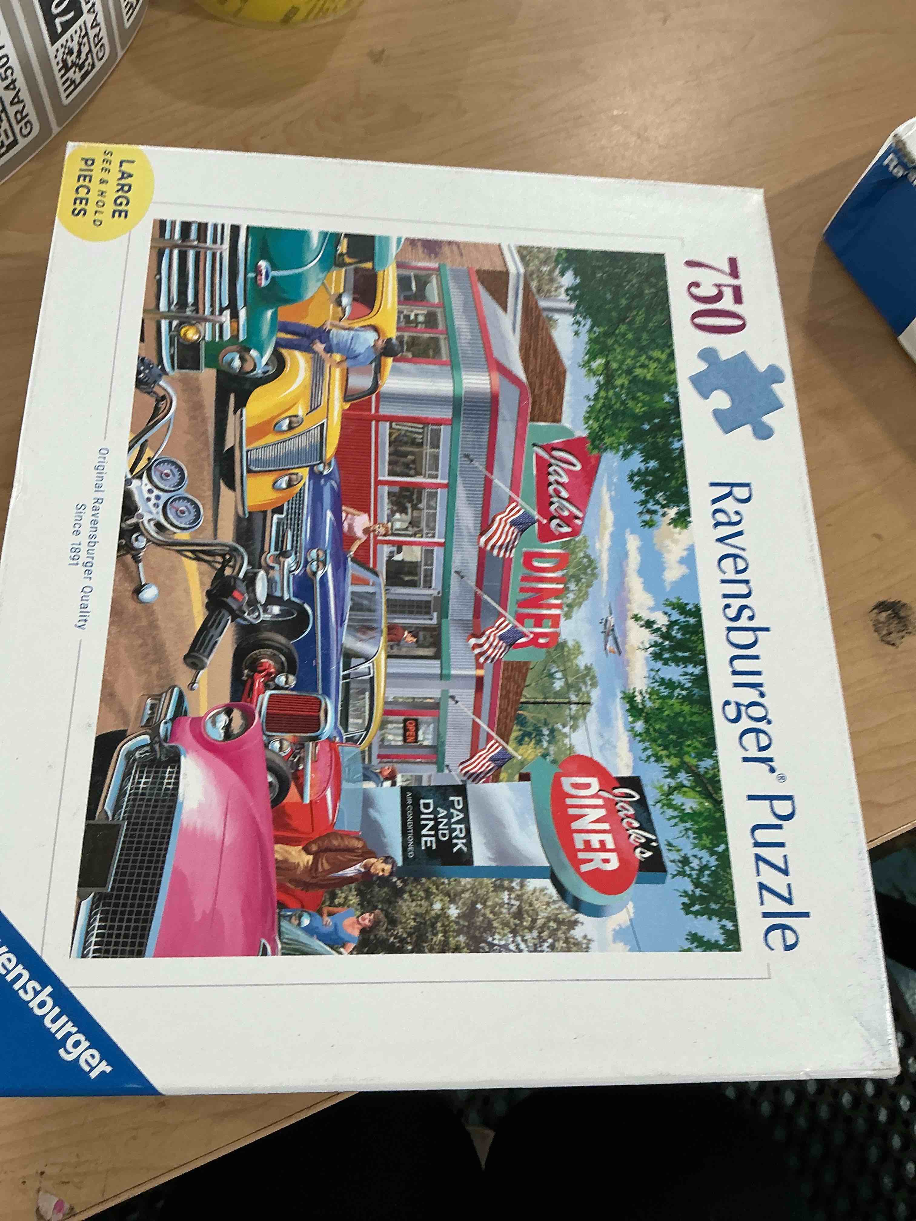 Condition photo showing New/Like New for ravensburger jacks diner new sealed jigsaw puzzle 32x24