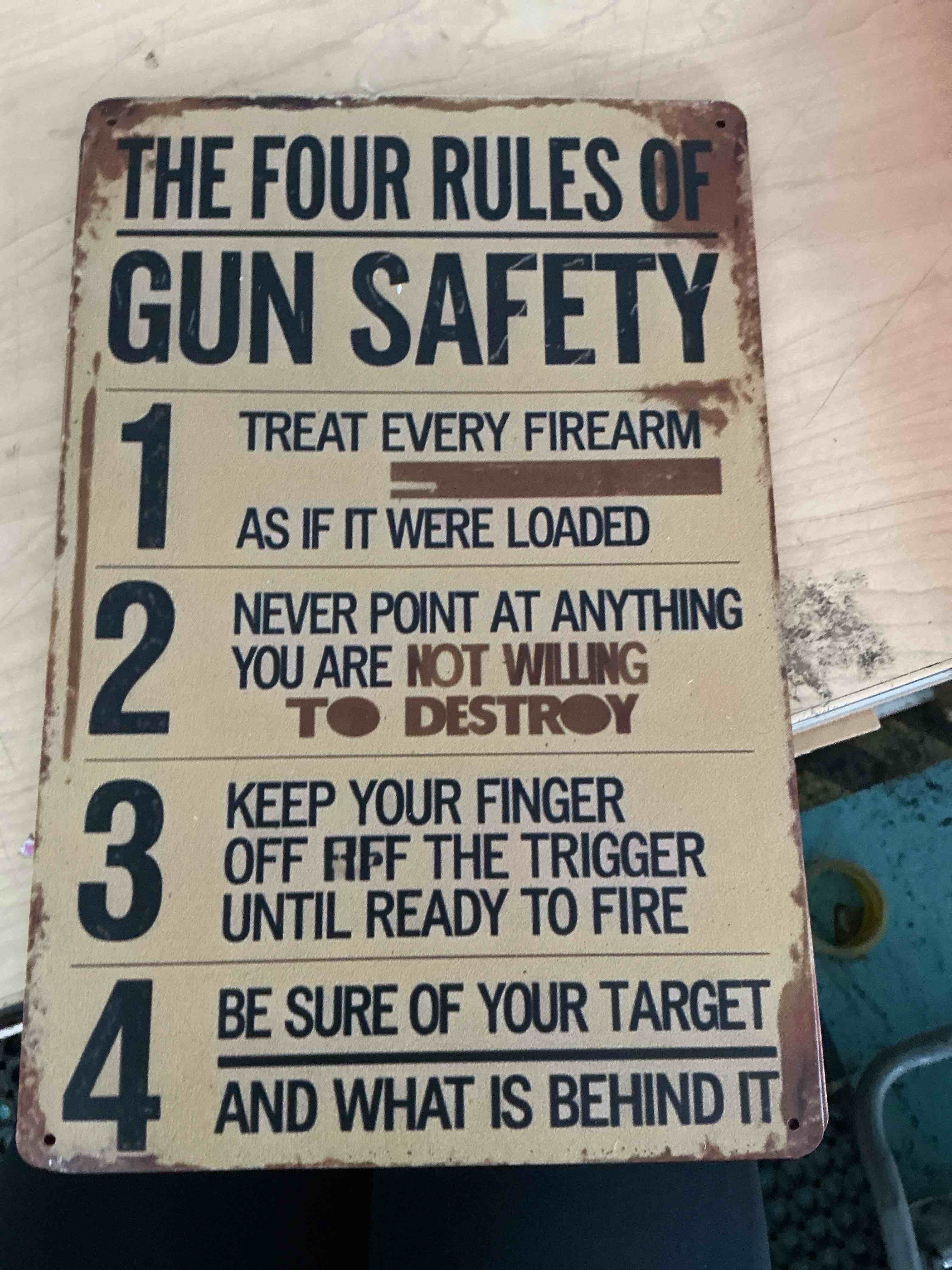 Condition photo showing New/Like New for the four rules of gun safety rules sign vintage plaque retro poster wall decor for home kitchen office cafe farm yard man cave decor 8x12 inch