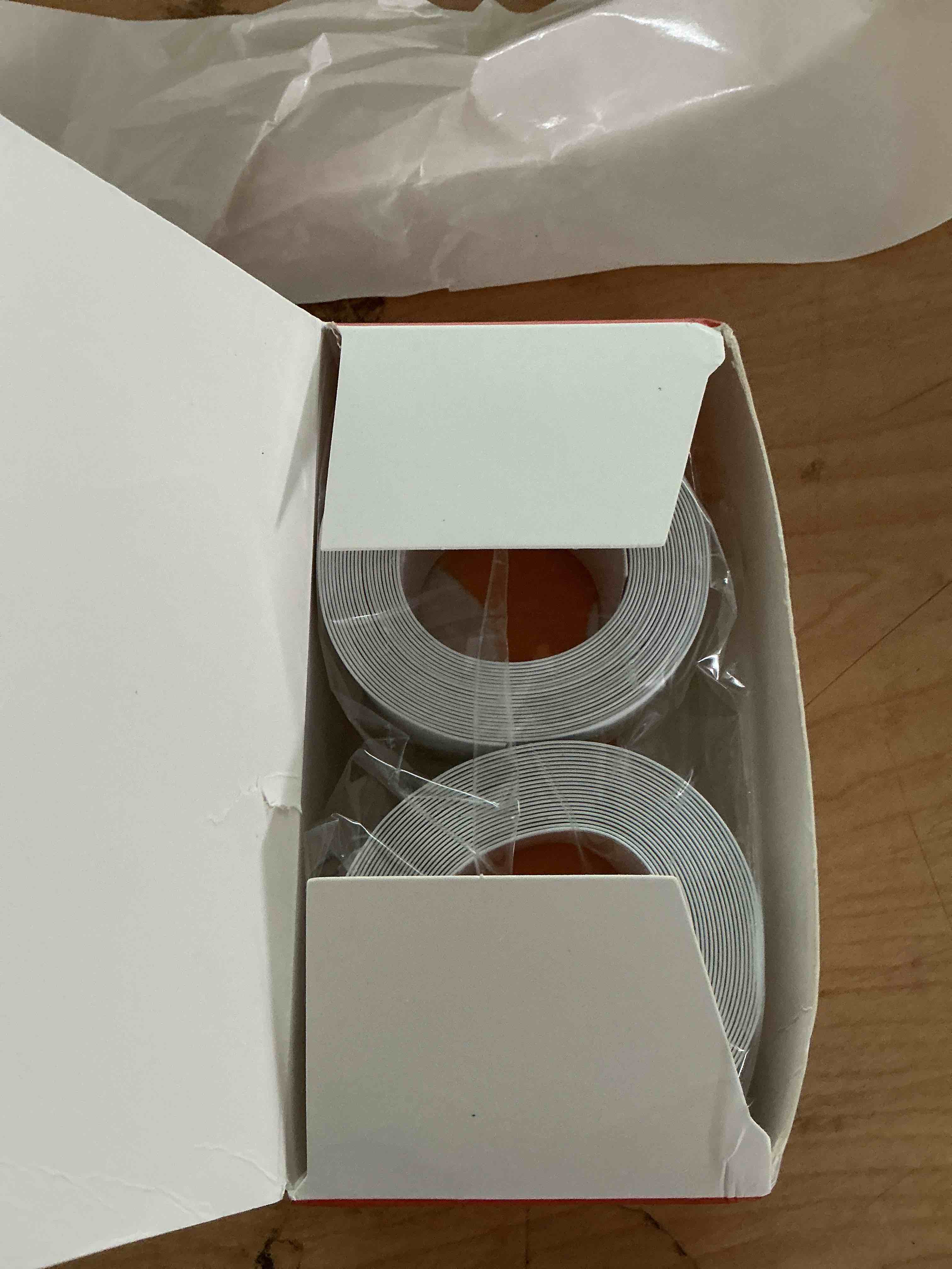 Condition photo showing New/Like New for mokani caulk tape waterproof self adhesive, 2 rolls white caulking sealant strip for kitchen, countertop, bathroom, sink, bathtub, toilet, floor wall edge protector with sealing tool (1.5" x 10.5ft)
