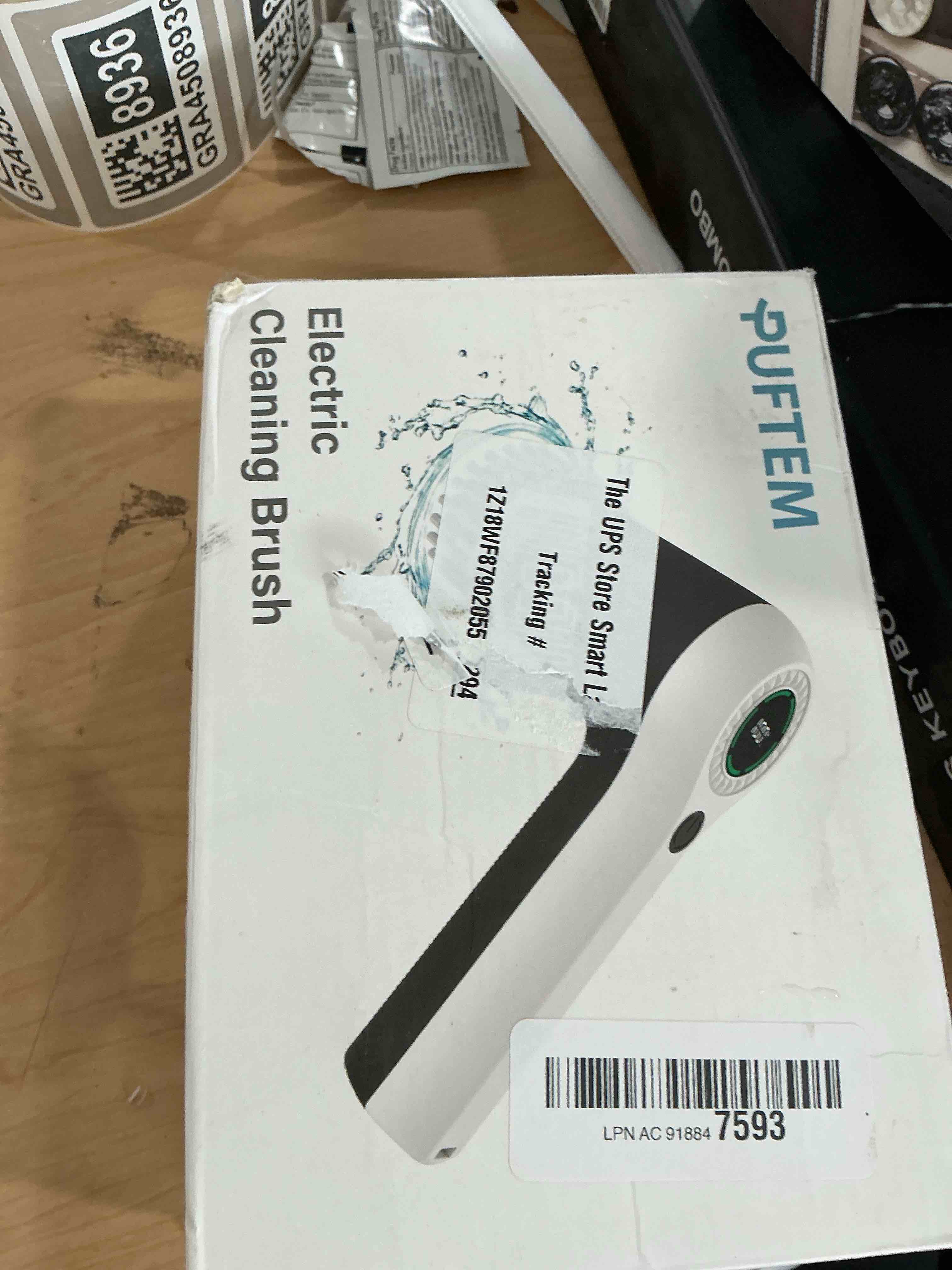 Condition photo showing New/Like New for puftem electric spin scrubber, cordless shower scrubber with battery level display, 2 speeds electric scrubber for cleaning with 6 replaceable heads, cleaning brush for bathroom/sink/window white