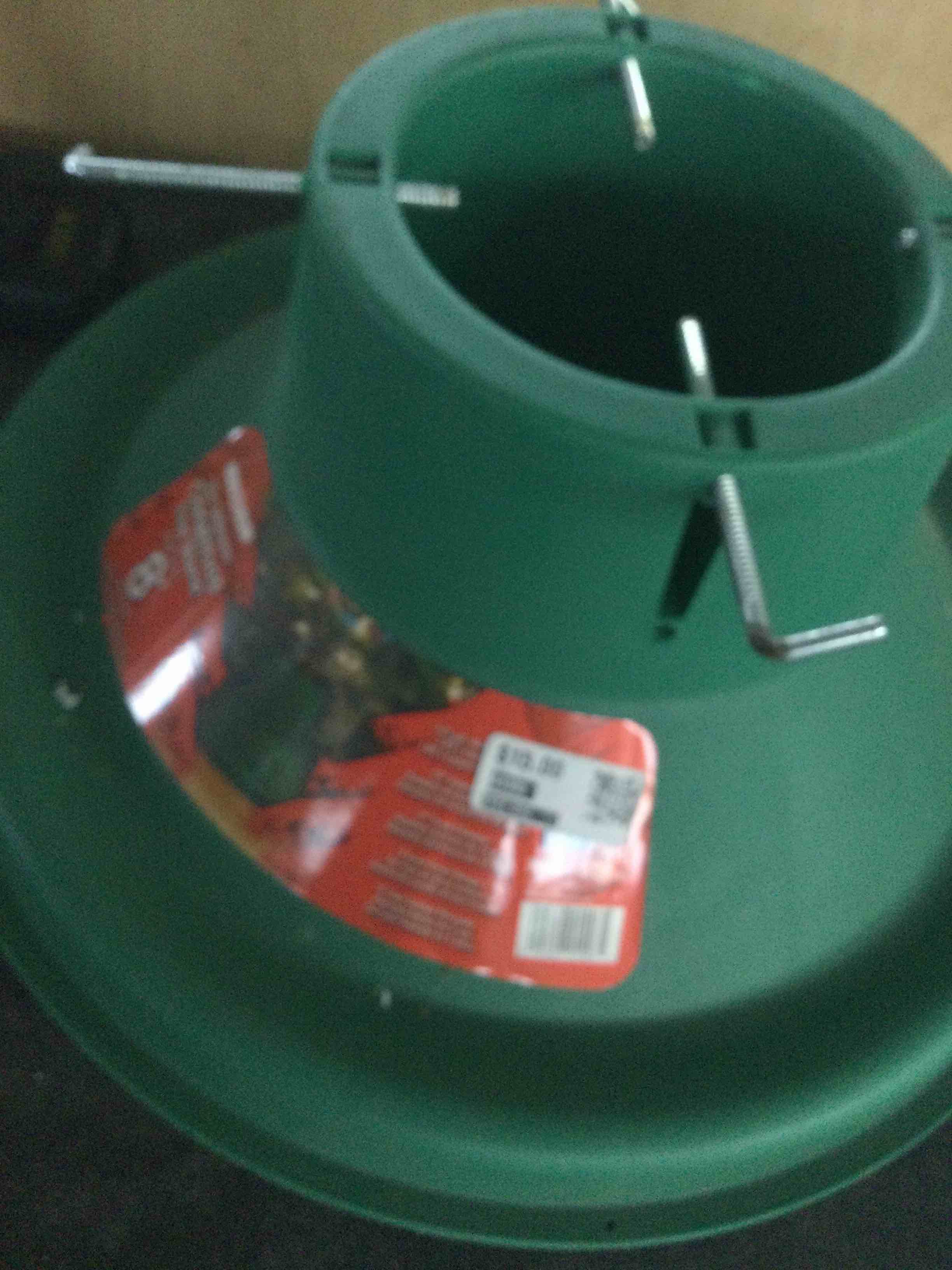 Condition photo showing New/Like New for the ultimate christmas tree stand, 6" trunk diameter, holds 8' tree, hms, 103-12