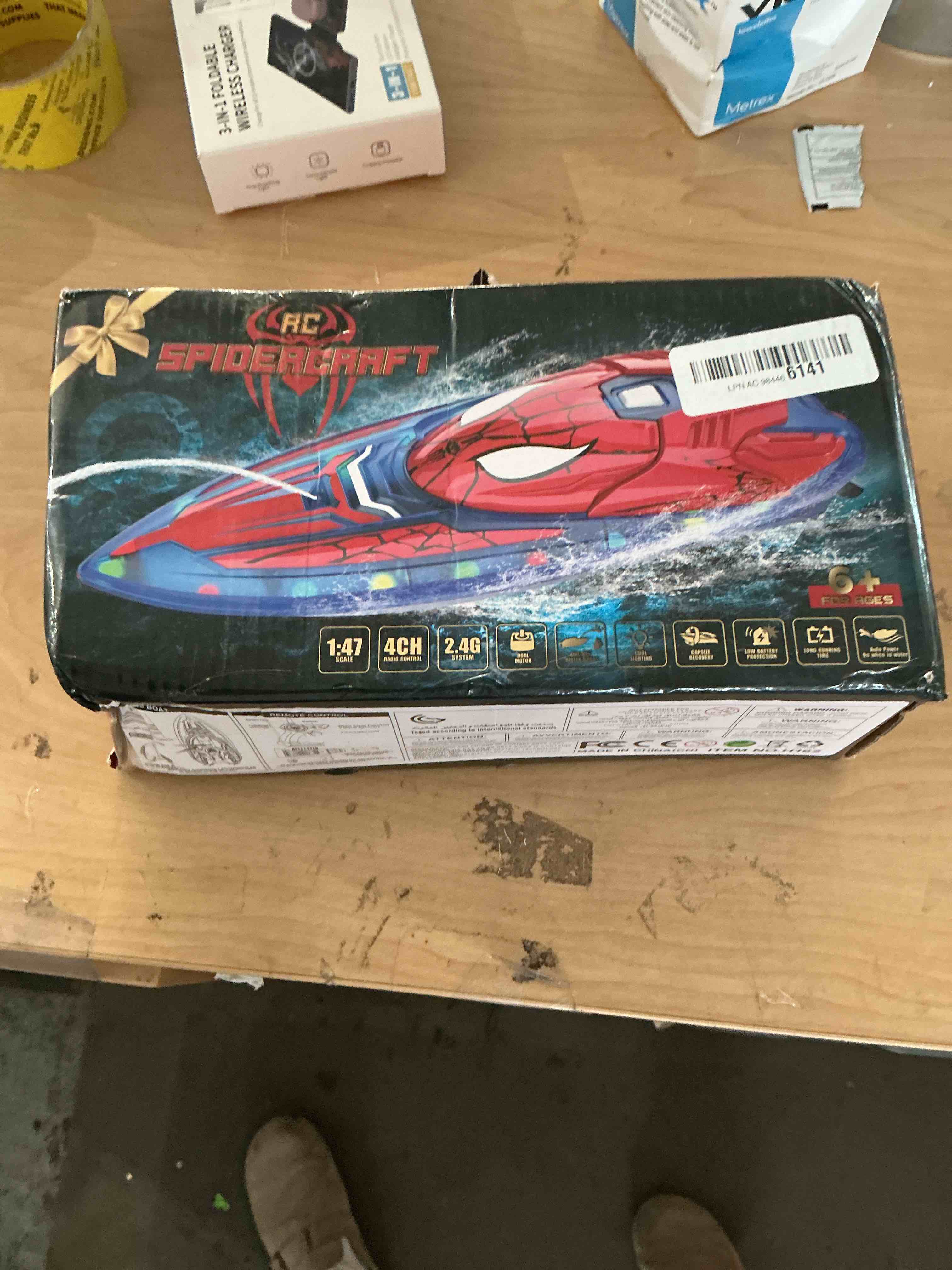 Condition photo showing New/Like New for spider hero rc boat, 2.4ghz remote control boat with led lights for kids, pool toy with 2 rechargeable batteries, spray function, and low battery alarm for boys & girls