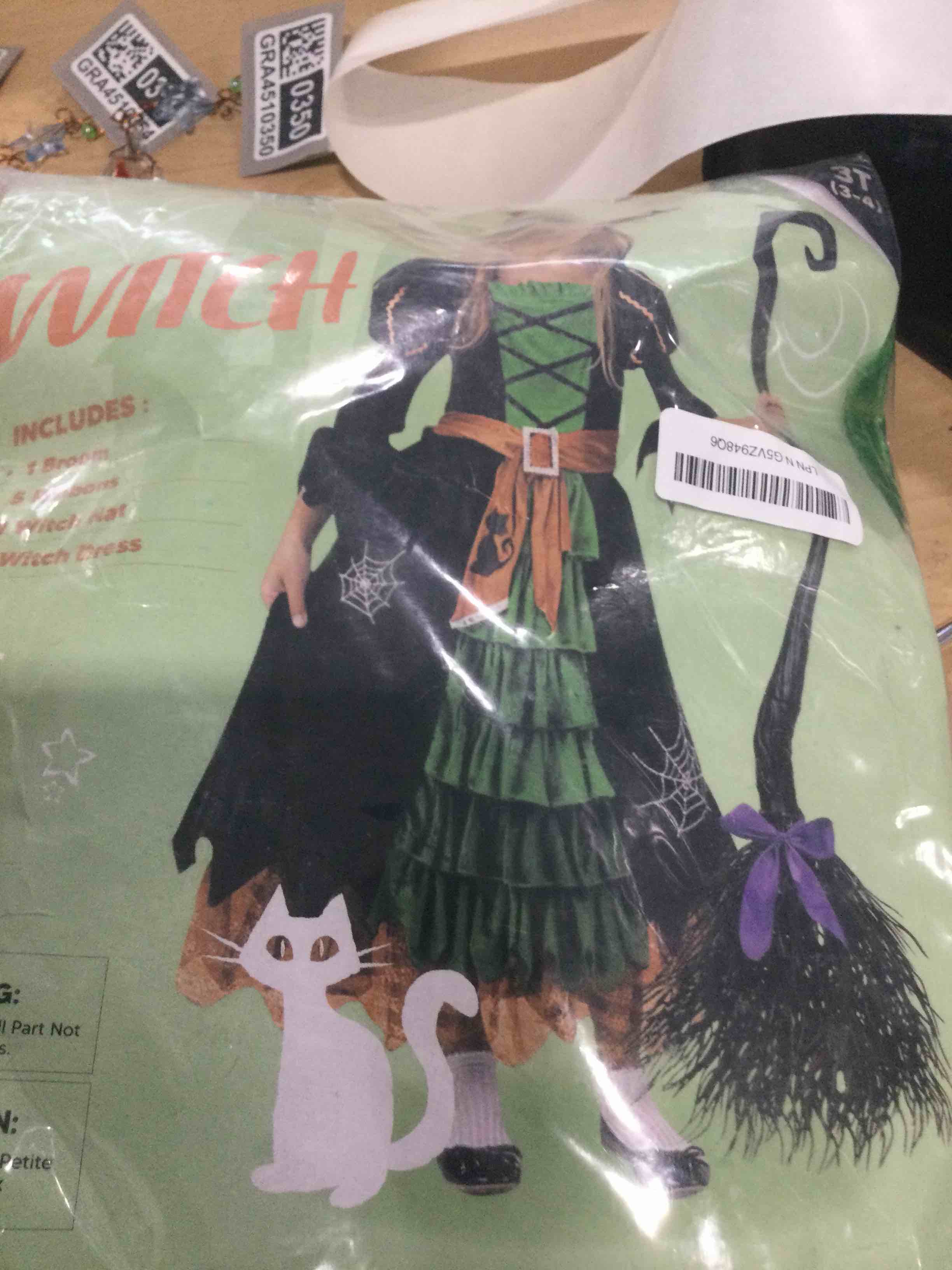 Condition photo showing New/Like New for spooktacular creations fairytale witch cute witch costume deluxe set with broom for girls green toddler(3-4 yrs)