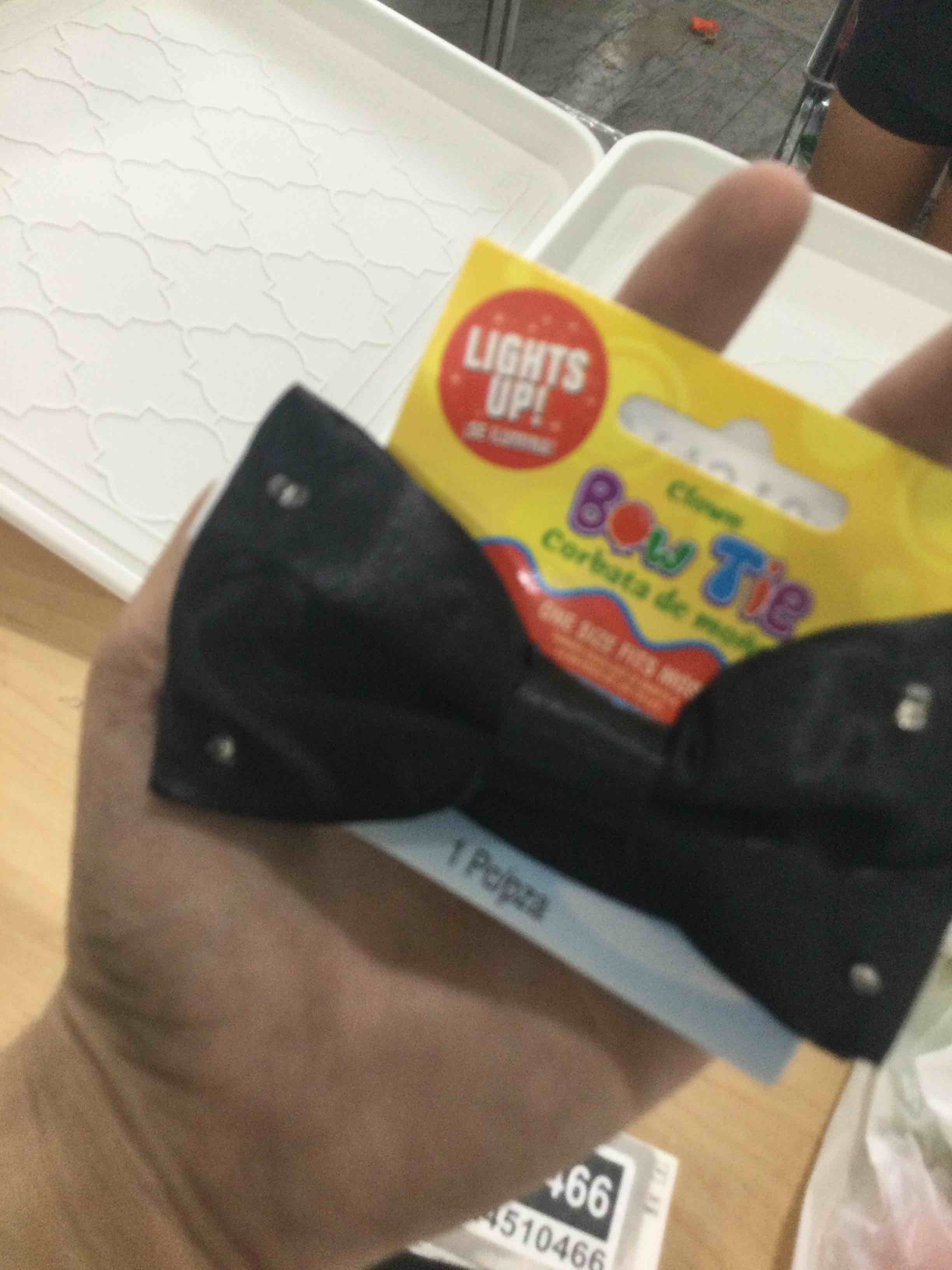 Condition photo showing New/Like New for amscan 849979 adult men's black light-up bow tie, standard size
