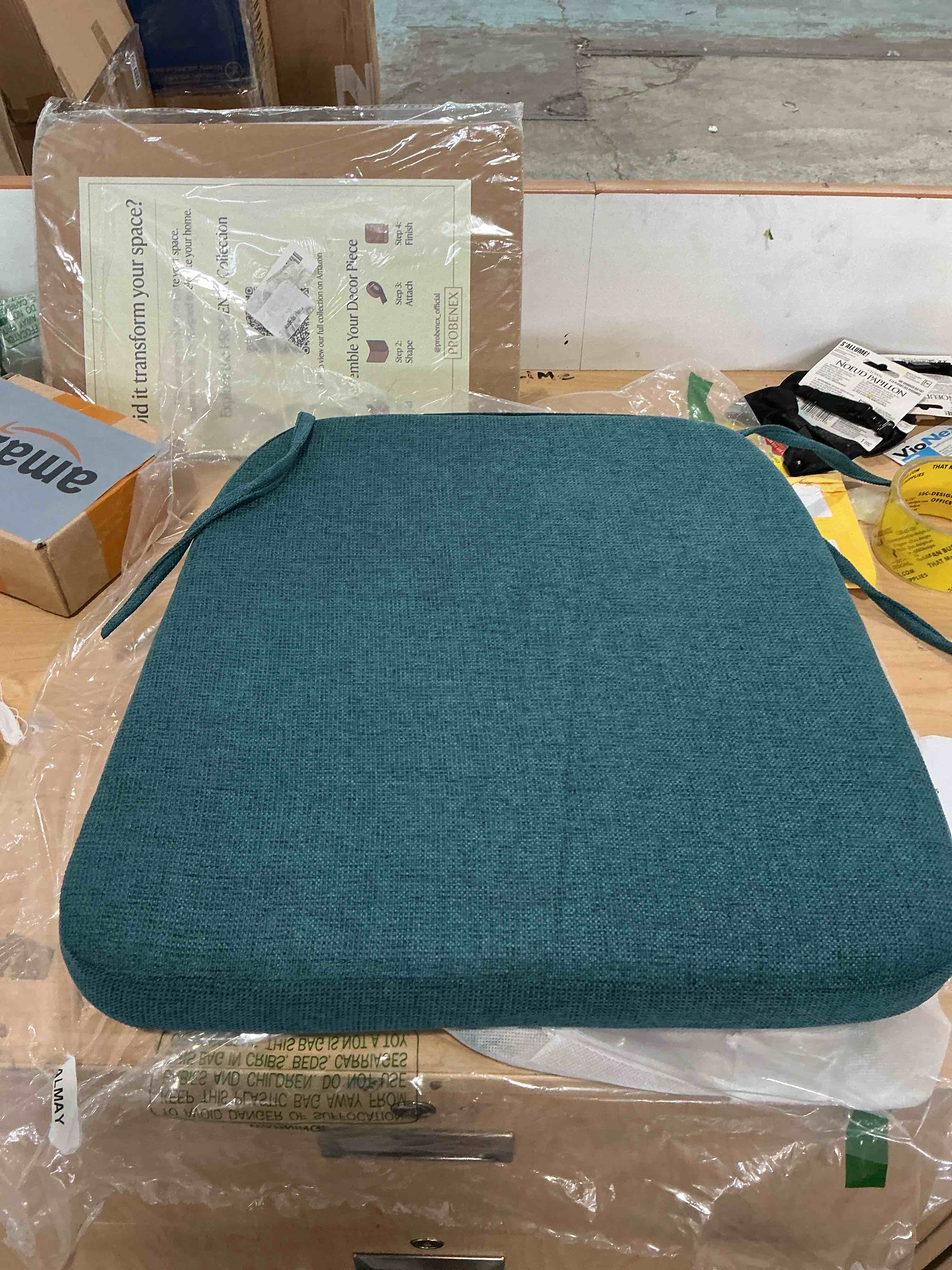 Condition photo showing New/Like New for honeycomb outdoor heritage set of 2 rounded seat pads, 21 x 18 | textured solid teal rounded dining chair cushions, water & fade resistant, recycled fill for indoor/outdoor seating