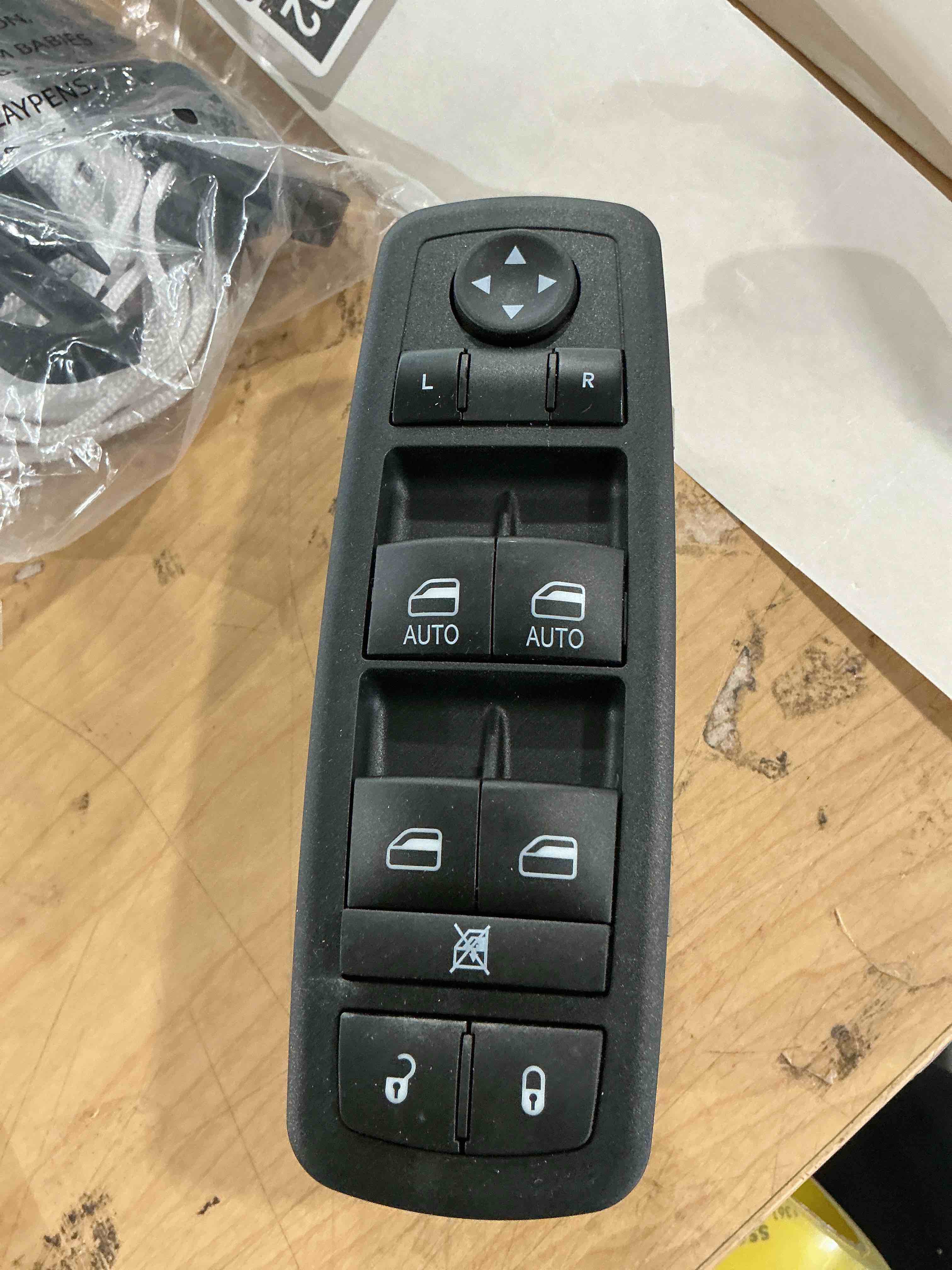 Condition photo showing New/Like New for power window switch driver side compatible with 2010-2011 chrysler town and country, dodge grand caravan - direct replacement oe 04602535ah 04602535ai (left front window control switch)
