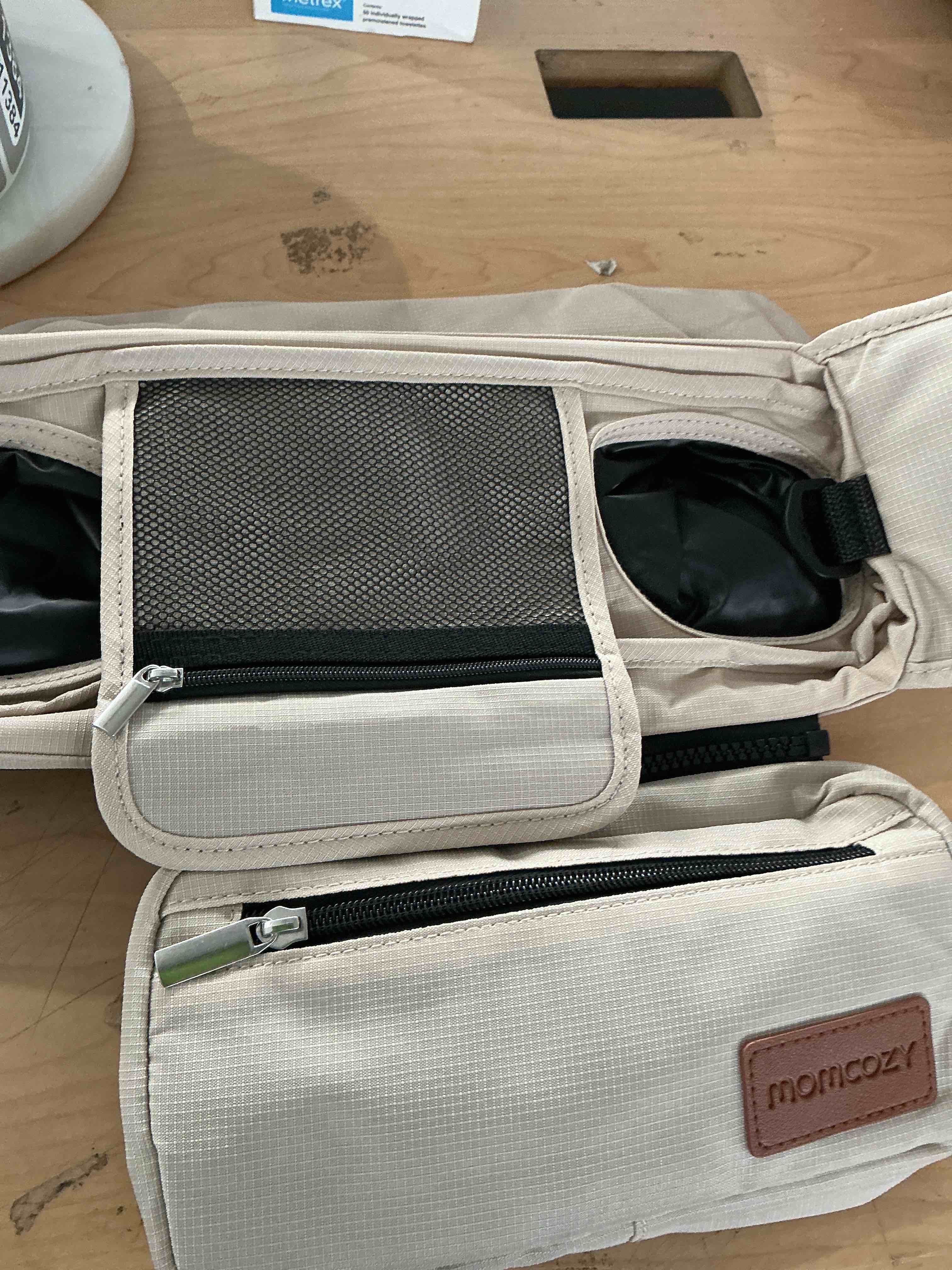 Condition photo showing New/Like New for momcozy universal stroller organizer with insulated cup holder | detachable phone bag and shoulder strap, fits for uppababy, baby jogger, britax, bob, umbrella, and pet strollers