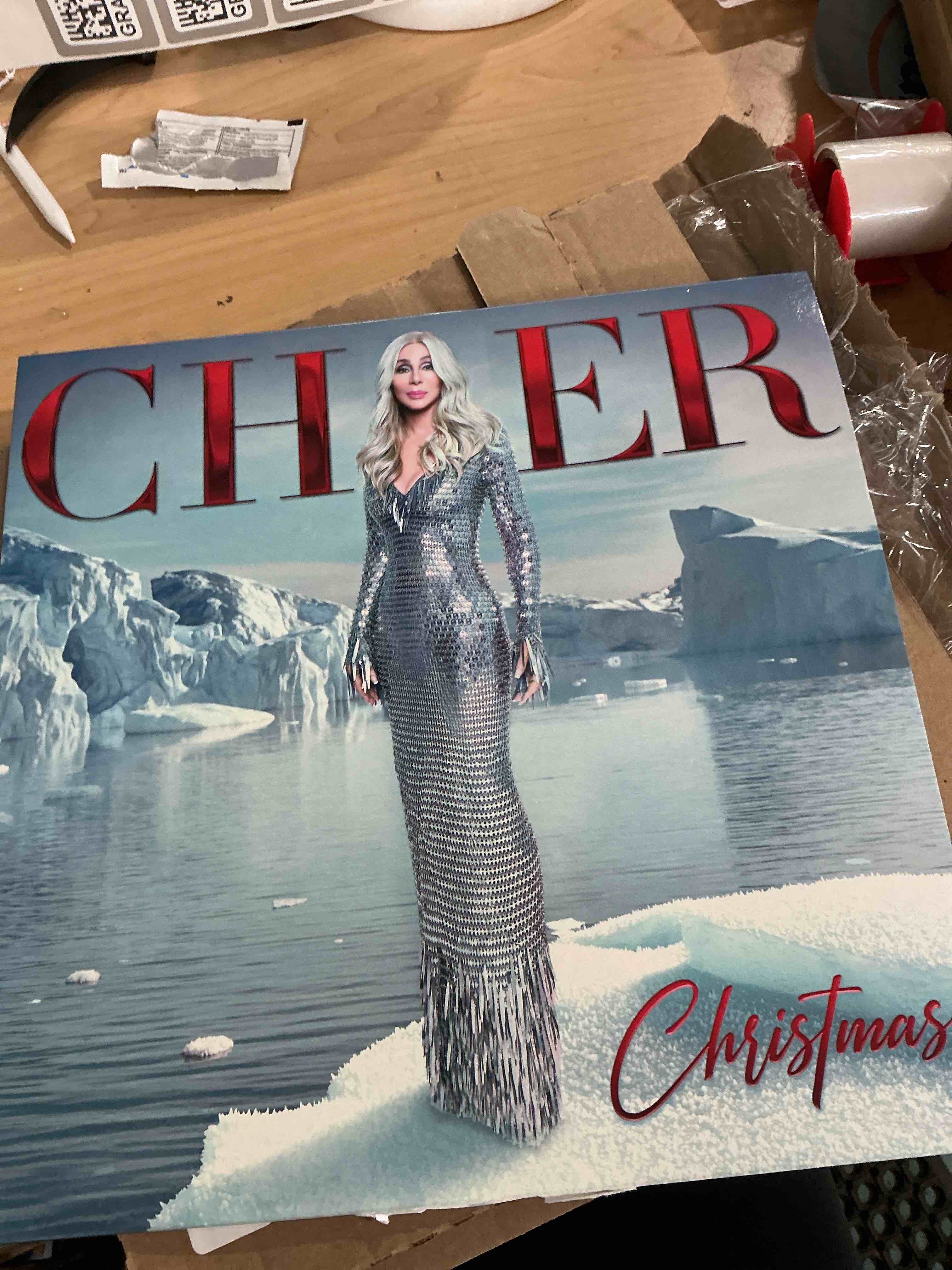 Condition photo showing New/Like New for christmas (amazon exclusive blue & white splatter vinyl + alternate cover)