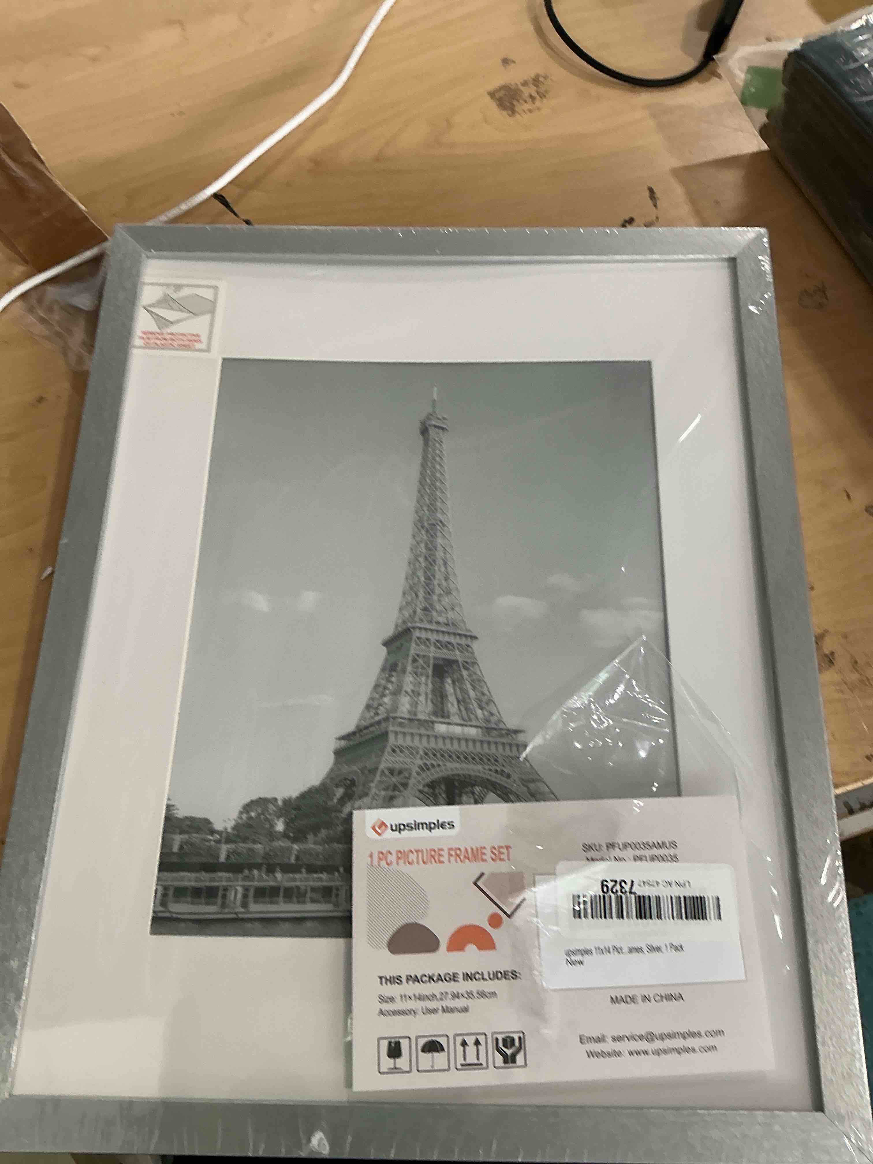 Condition photo showing New/Like New for upsimples 11x14 picture frame, display pictures 8x10 with mat or 11 x 14 without, wall hanging photo frames, silver, 1 pack silver 11x14