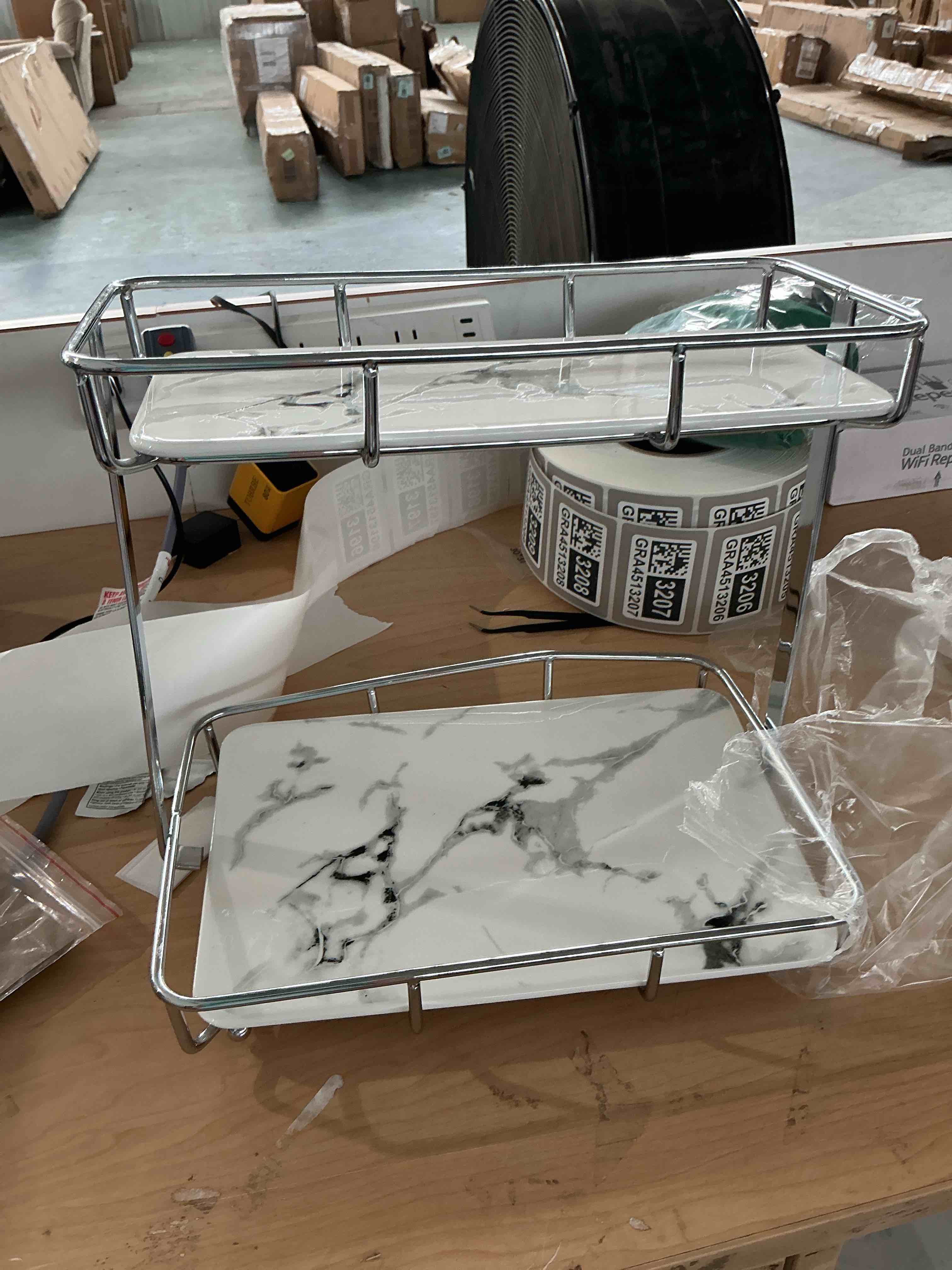 Condition photo showing As Is for bathroom organizer countertop perfume organizer makeup organizer cosmetics storage display rack vanity tray dresser stainless steel gold shelf white marble ceramic tray (2 tier l-sliver) | perfume organizer, makeup organizer, cosmetics storage, vanity tray, dresser, shelf metal is bent 
