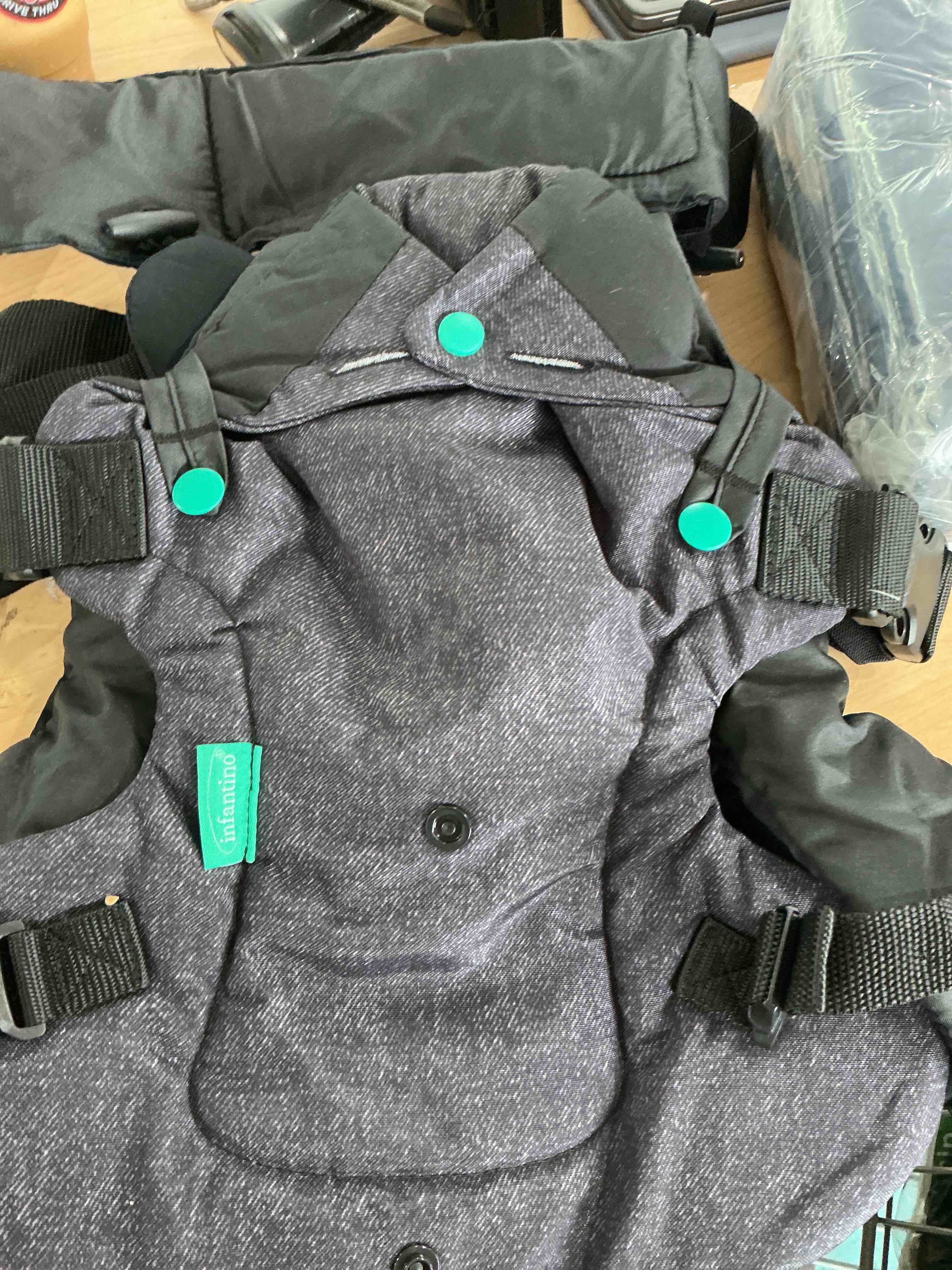 Condition photo showing New/Like New for infantino flip 4-in-1 convertible baby carrier, adjustable, ergonomic babywearing, registry essential, baby carrier for newborn to toddler, gray
