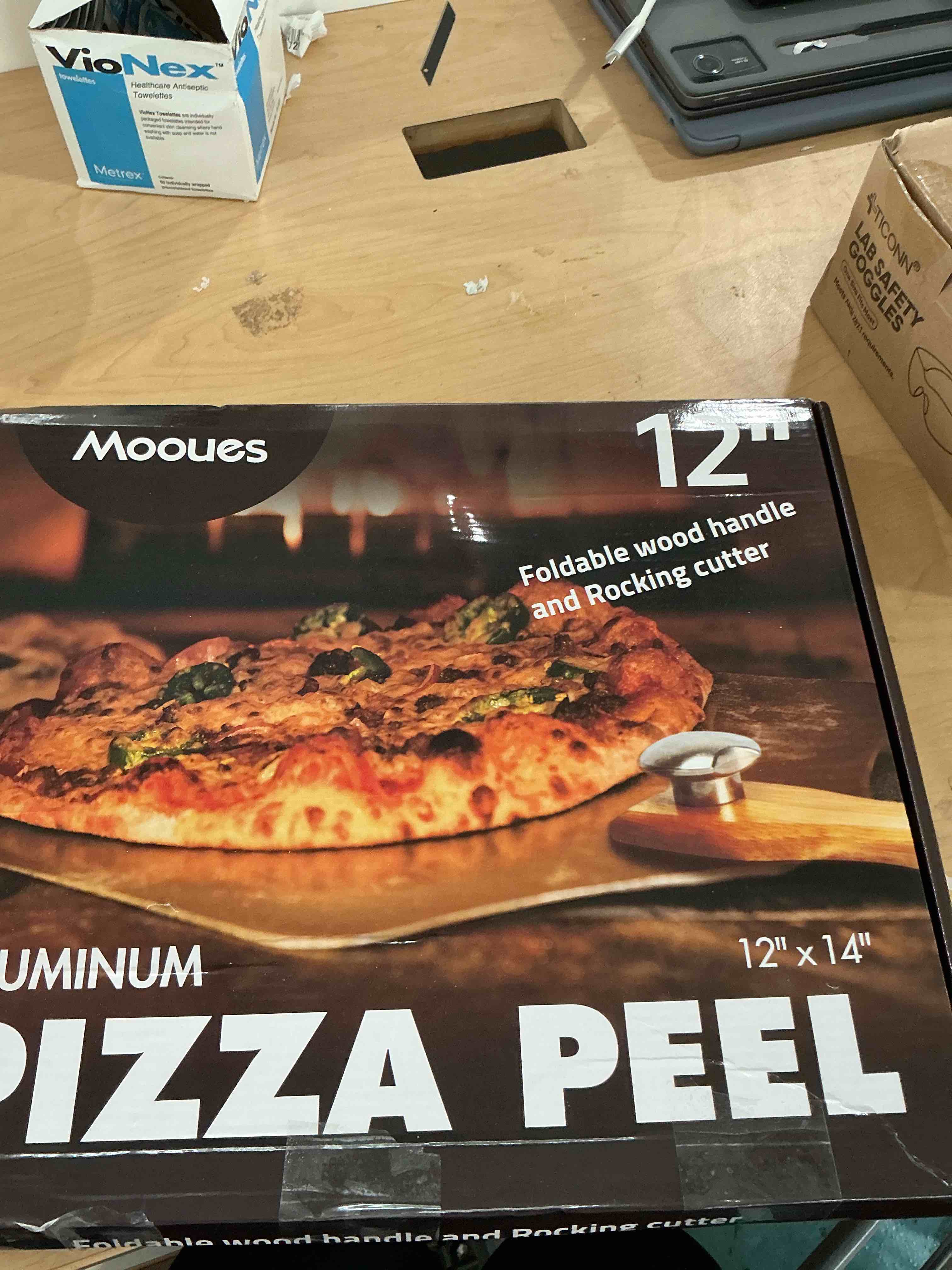 Condition photo showing New/Like New for pizza peel aluminum pizza spatula, mooues 12 inch metal pizza paddle(12"x 14")with rocker cutter foldable wood handle, [storage bag included], for family pizza oven baking pizza, dough, bread & pastry pizza peel 12"x 14" with rocker cutter