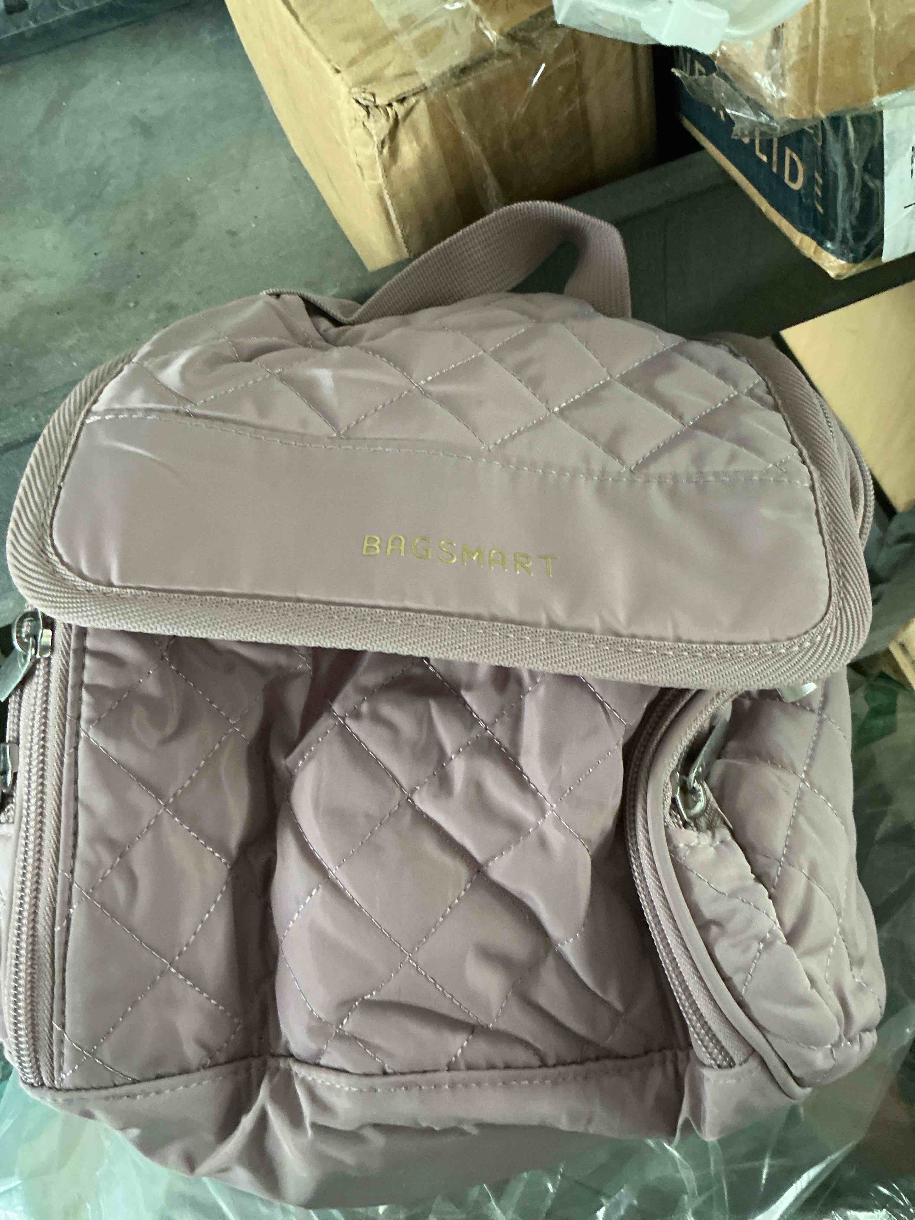 Condition photo showing New/Like New for bagsmart travel toiletry bag, large capacity cosmetic bags for women with hanging hook, water-resistant for toiletries accessories brushes sponge, with handle(purple)