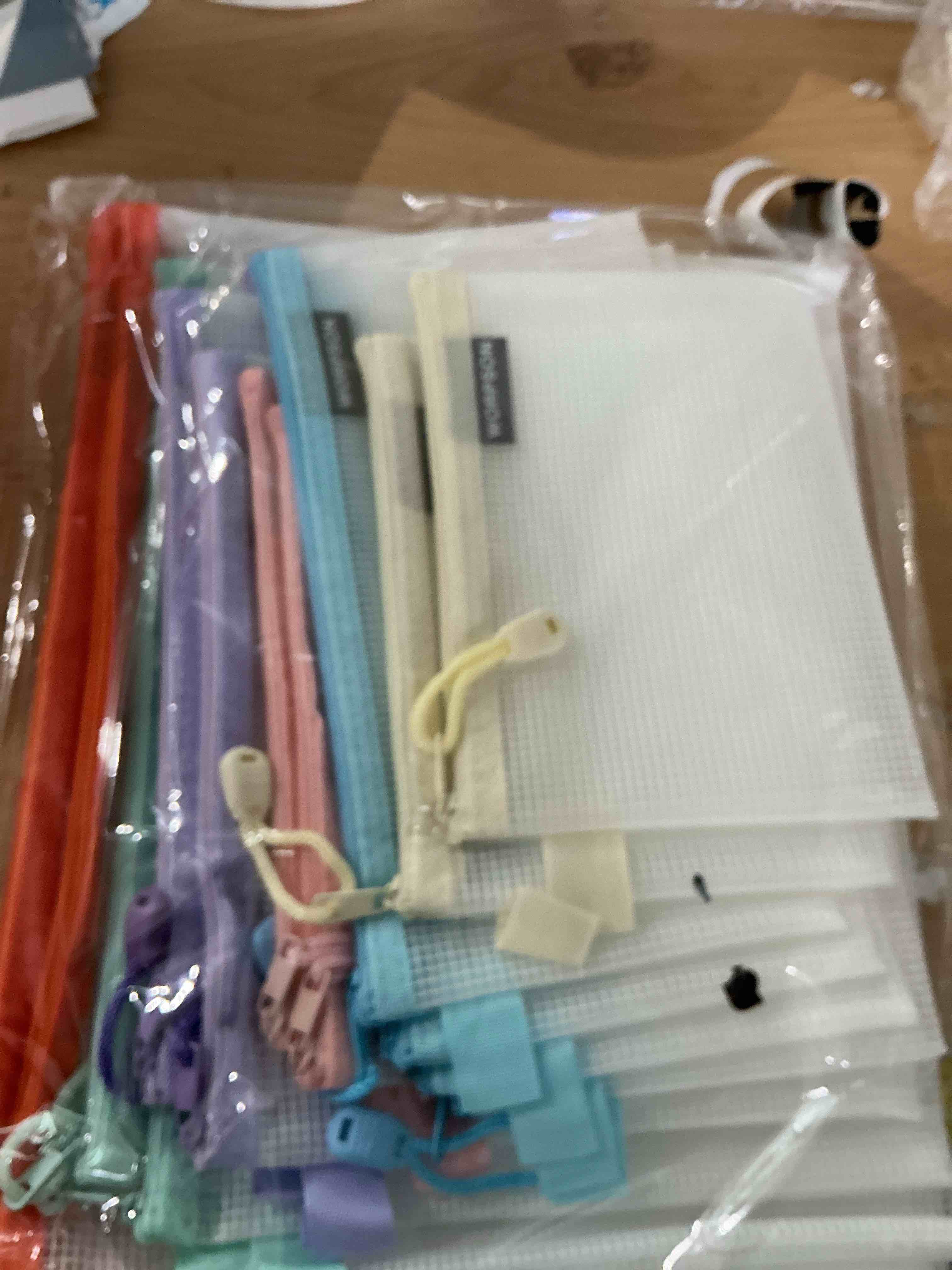 Condition photo showing New/Like New for eva frosted mesh zipper pouch bags,18 pcs 6 sizes plastic bags, 6 colors waterproof pouches, for travel, school supplies, office and home organization (18 pcs, multicolor)